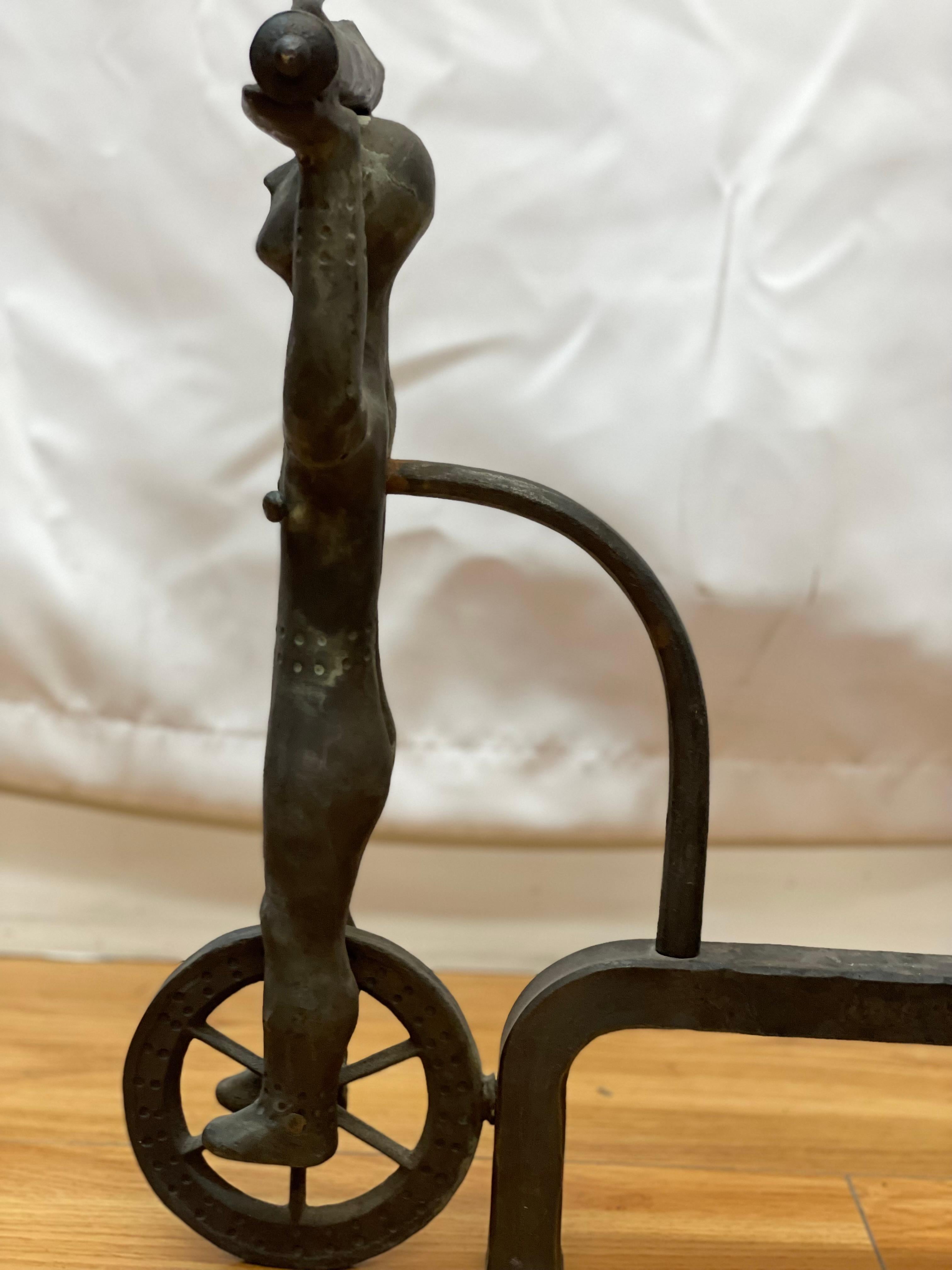 Iron Rare Andirons With Acrobats on Wheels Circa 1940's For Sale