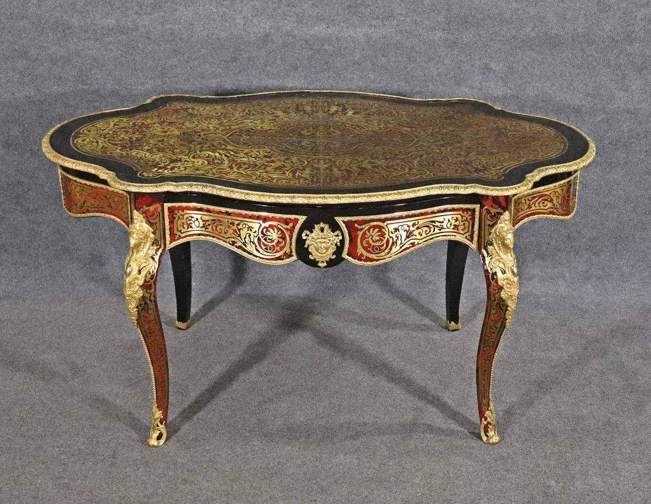 Gilt accents. Figural. One dovetailed drawer. 29 1/2