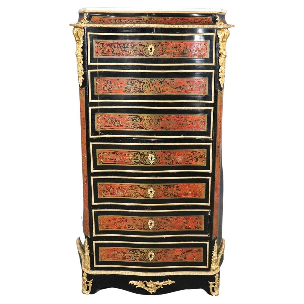 Figural. Gilt accents. Marble top. 4 drawers. Pull down top containing shelves and drawers. 53 1/2