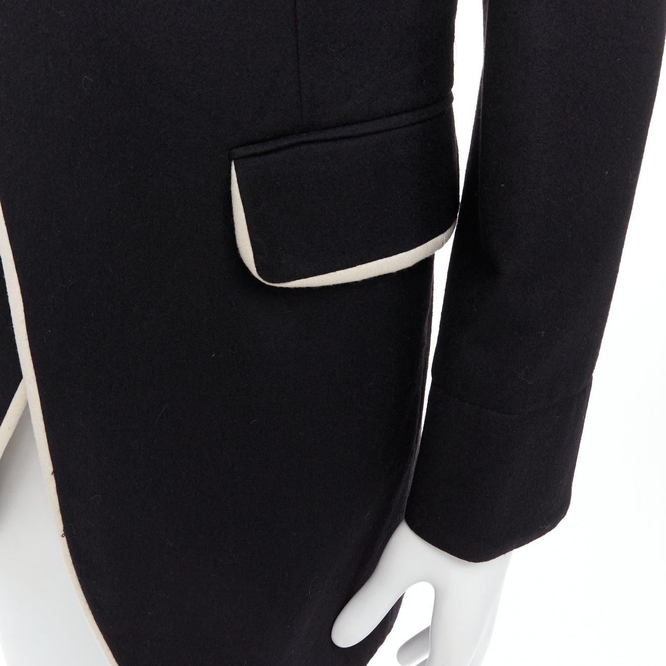 rare ANN DEMEULEMEESTER black virgin wool cotton shawl pipe collar coat XXS
Reference: PRWU/A00131
Brand: Ann Demeulemeester
Material: Virgin Wool, Cotton
Color: Black, White
Pattern: Solid
Closure: Button
Lining: Black Fabric
Made in: