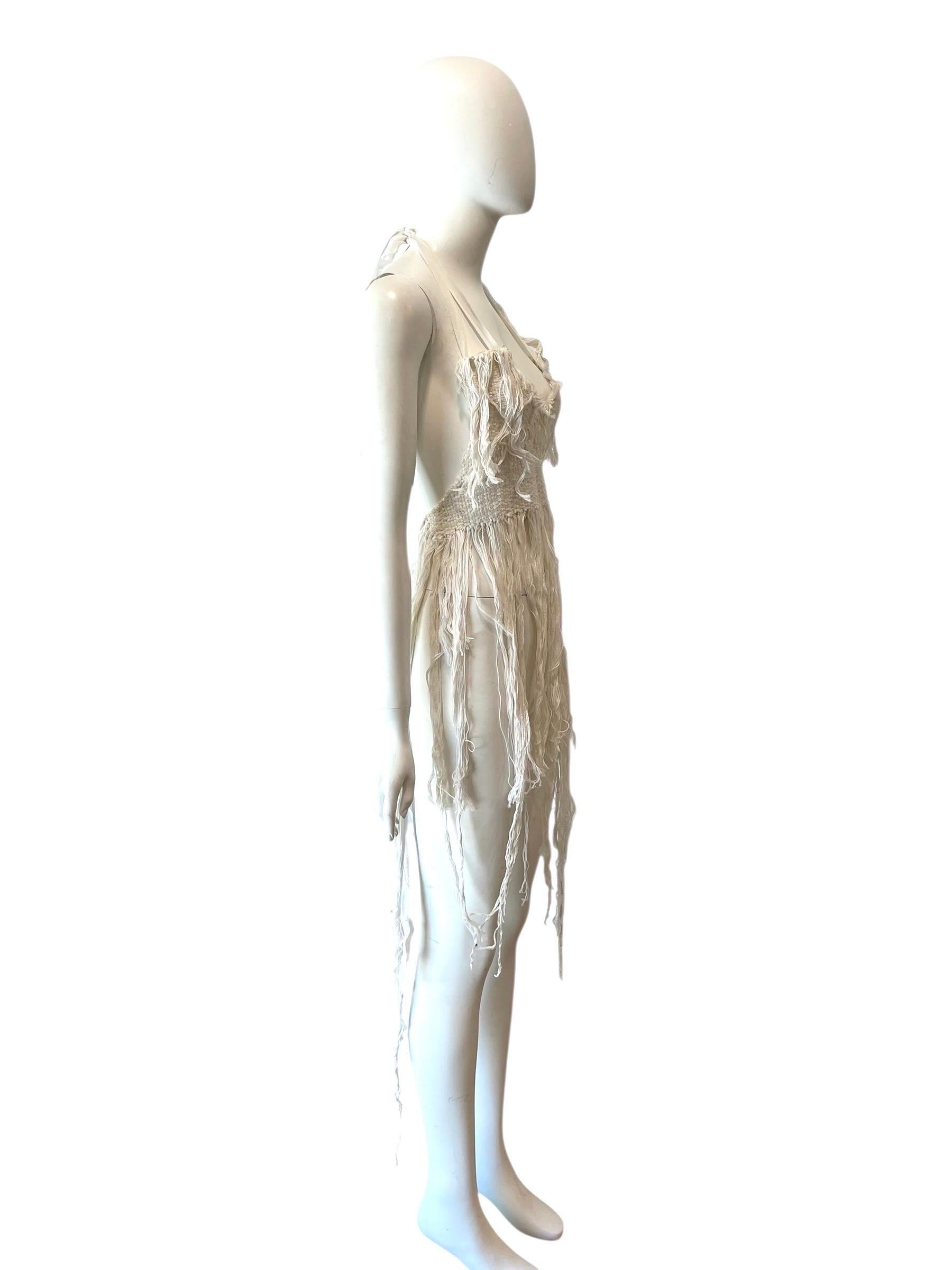 1990s - 2000s Rare white hand woven 
ANN DEMEULEMEESTER fringed apron top
100% cotton hand woven fabric
Condition: Excellent
Bust: free, Waist free, Hip free, 10