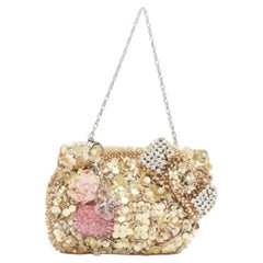 rara ANTEPRIMA HELLO KITTY Bolsa de alambre floral de cuero de lentejuelas de color rosa encantos de embrague