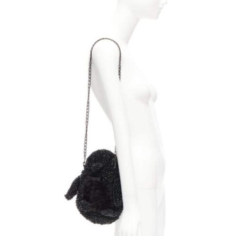 rare ANTEPRIMA Wire Bag  black fur belly woven acrylic penguin chain crossbody
Reference: ANWU/A01061
Brand: Anteprima
Collection: Wire Bag
Material: Plastic
Color: Black
Pattern: Solid
Closure: Zip
Extra Details: Back zip. Fur and acrylic bowtie