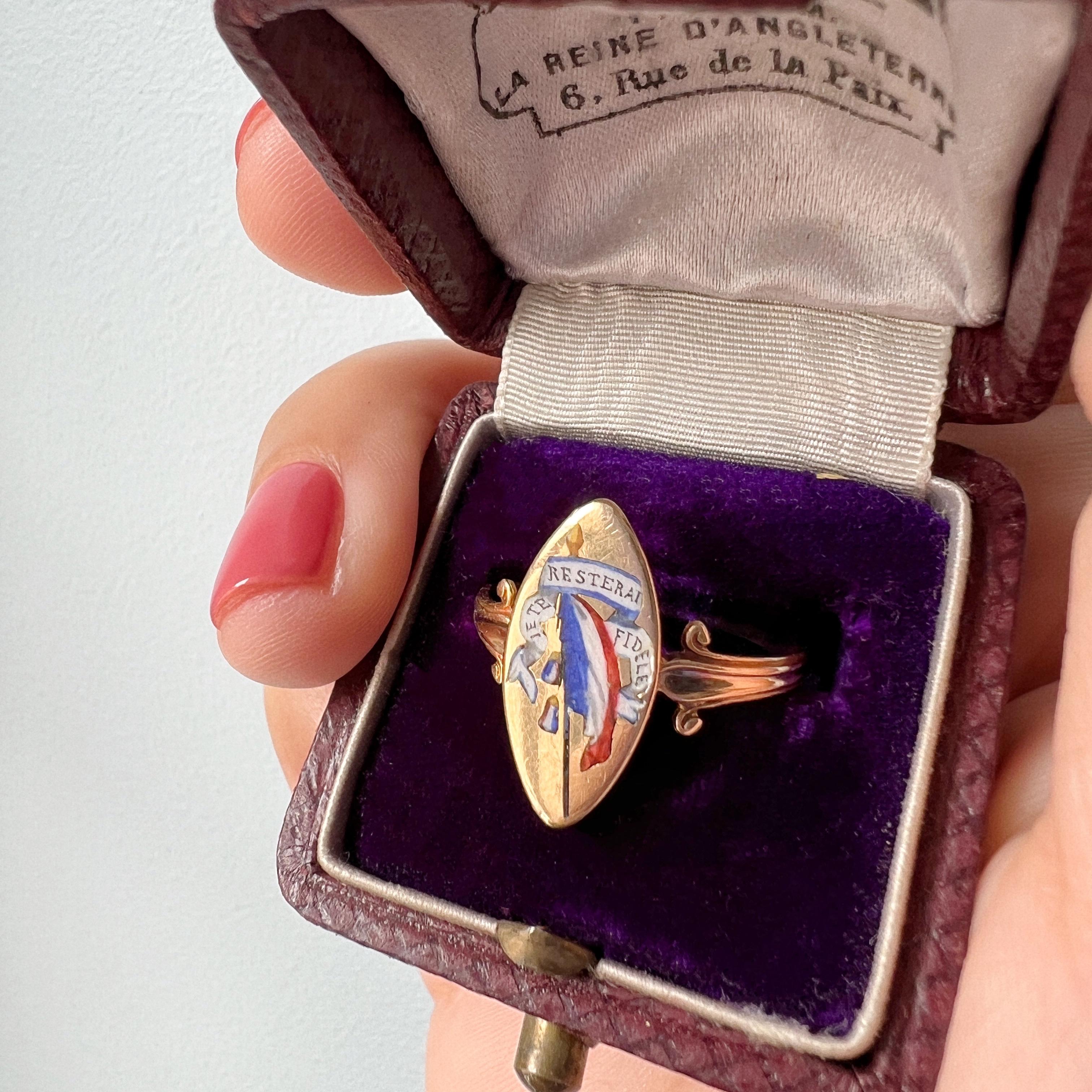 For sale a rare 18K gold French ring from the 19th Century, as an extraordinary relic of French history and patriotism.

At the heart of the ring is a meticulously enameled motif depicting the proud colors of the French flag: blue, white, and red.