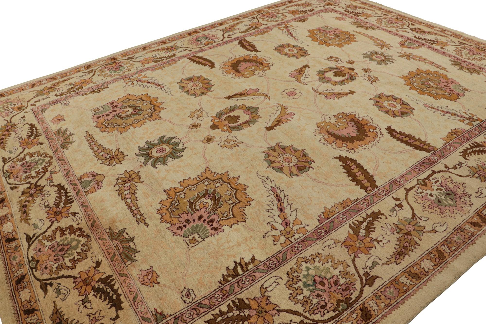 Hand knotted in wool originating from India circa 1890-1900, this 10x12 antique rug represents a rare large-size Agra rug of further exceptional color and refined pattern—revered among the most sought-after classic rug families seldom enjoying such