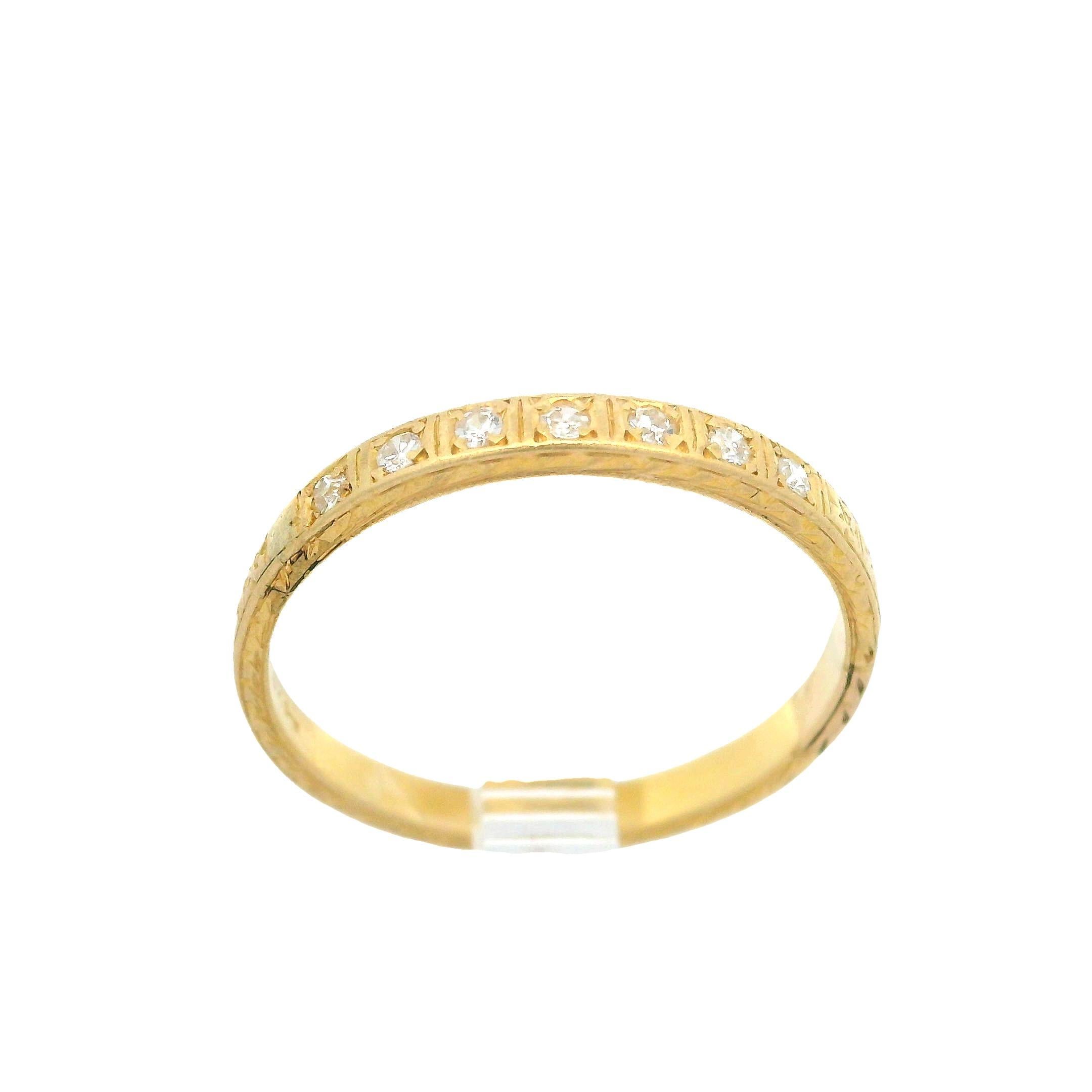 –Stone(s)–
(7) Natural Genuine Diamond - Single Cut - Pave Set - 0.14ctw (approx.)

Material: Solid 18k Yellow Gold
Weight: 2.5 Grams
Ring Size: 8.5 (Fitted on a finger, item can not be sized)
Ring Width: 2.46mm (approx.)
Ring Height: 1.50mm rise