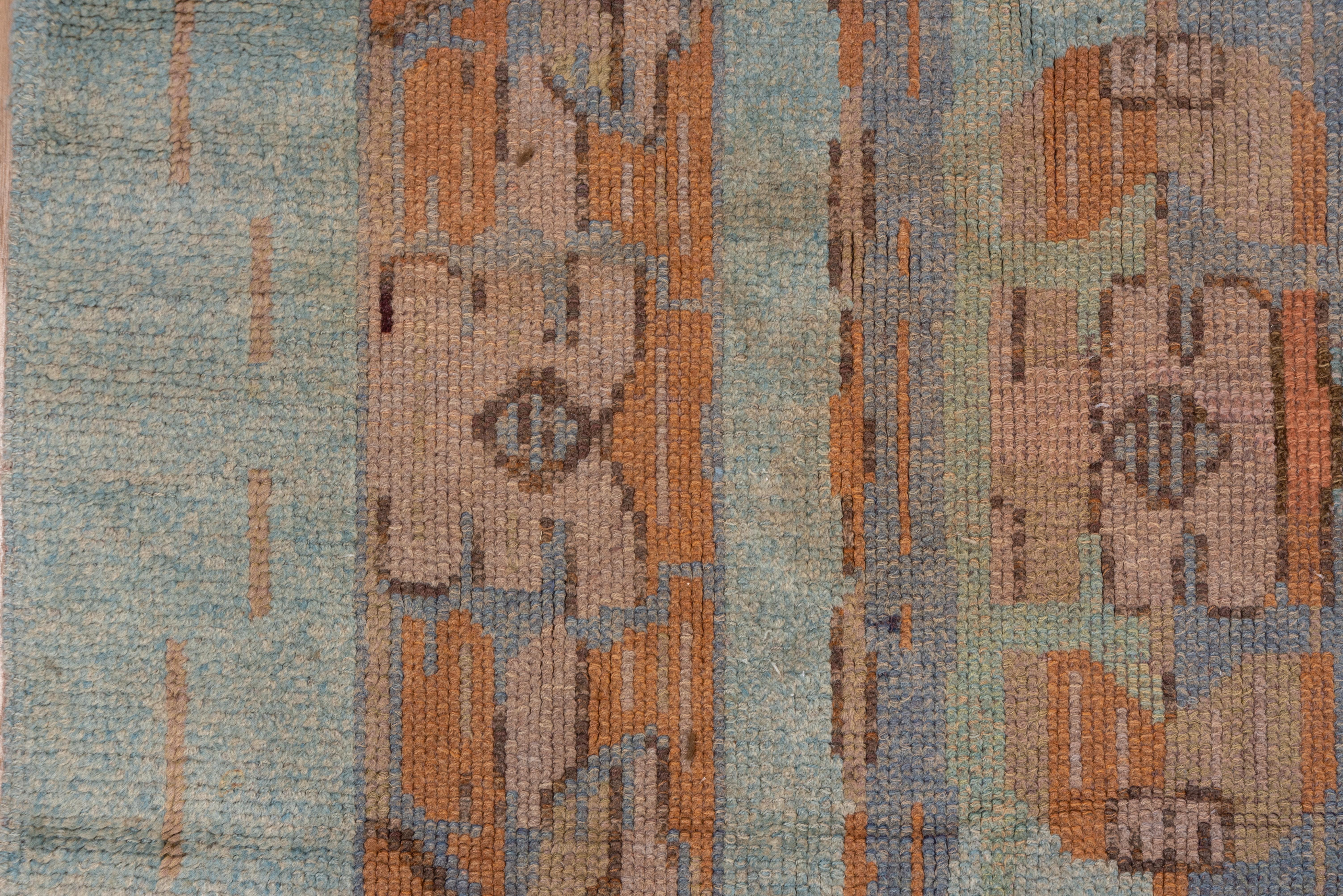 An Art Deco period creation, this northern European carpet shows a broadly divided grey taupe medallion and en suite corners, with a Modernist straight diagonal stem and leaf border. Goldenrod details. Requires a Deco or post decor, Lighter palette.