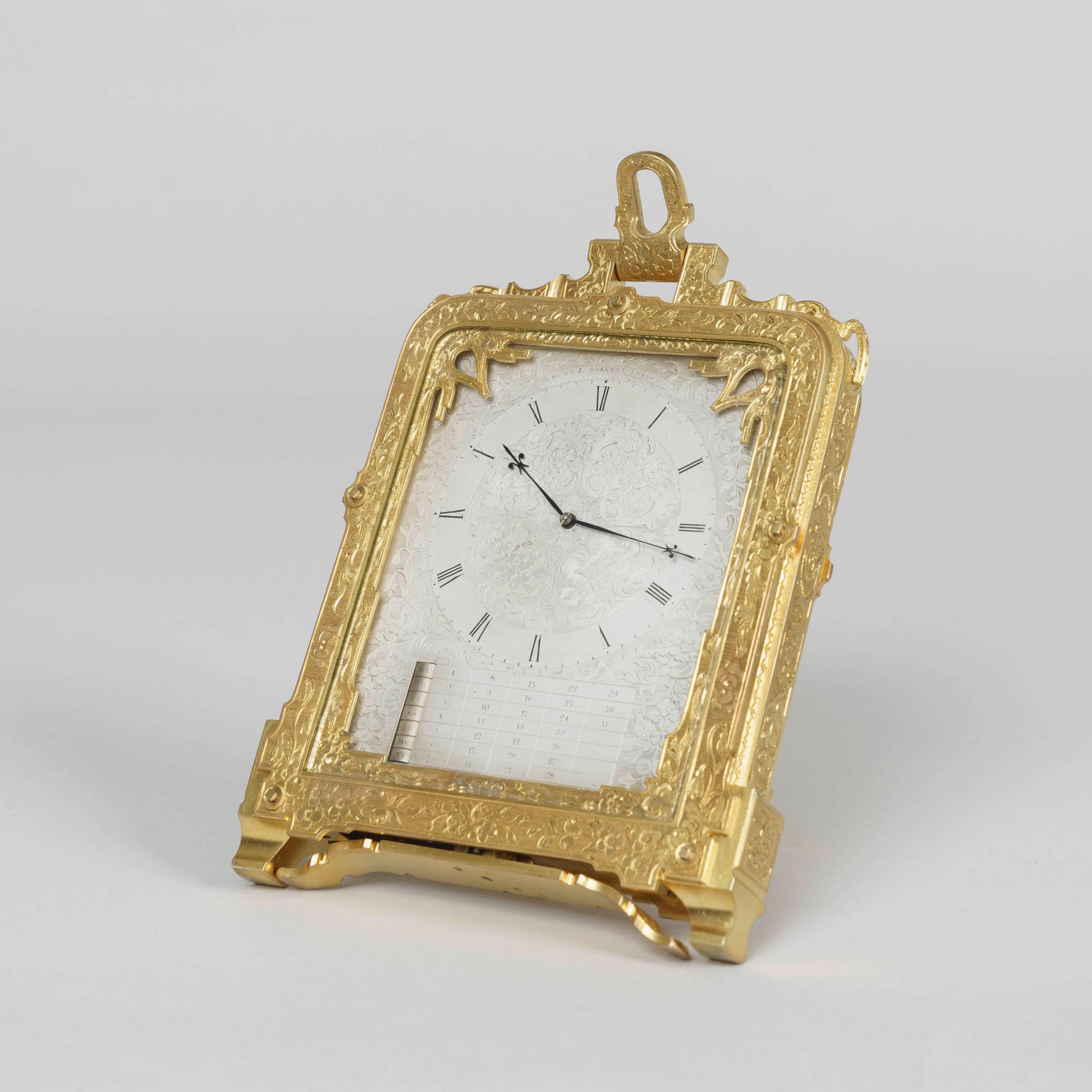 A very early strut clock
Retailed by Hunt & Roskell
By Thomas Cole

A rare pre-numbered strut clock of beautiful design and execution, having the standard revolving strut attachment to the base for support, a spring-loaded catch-operated bracket