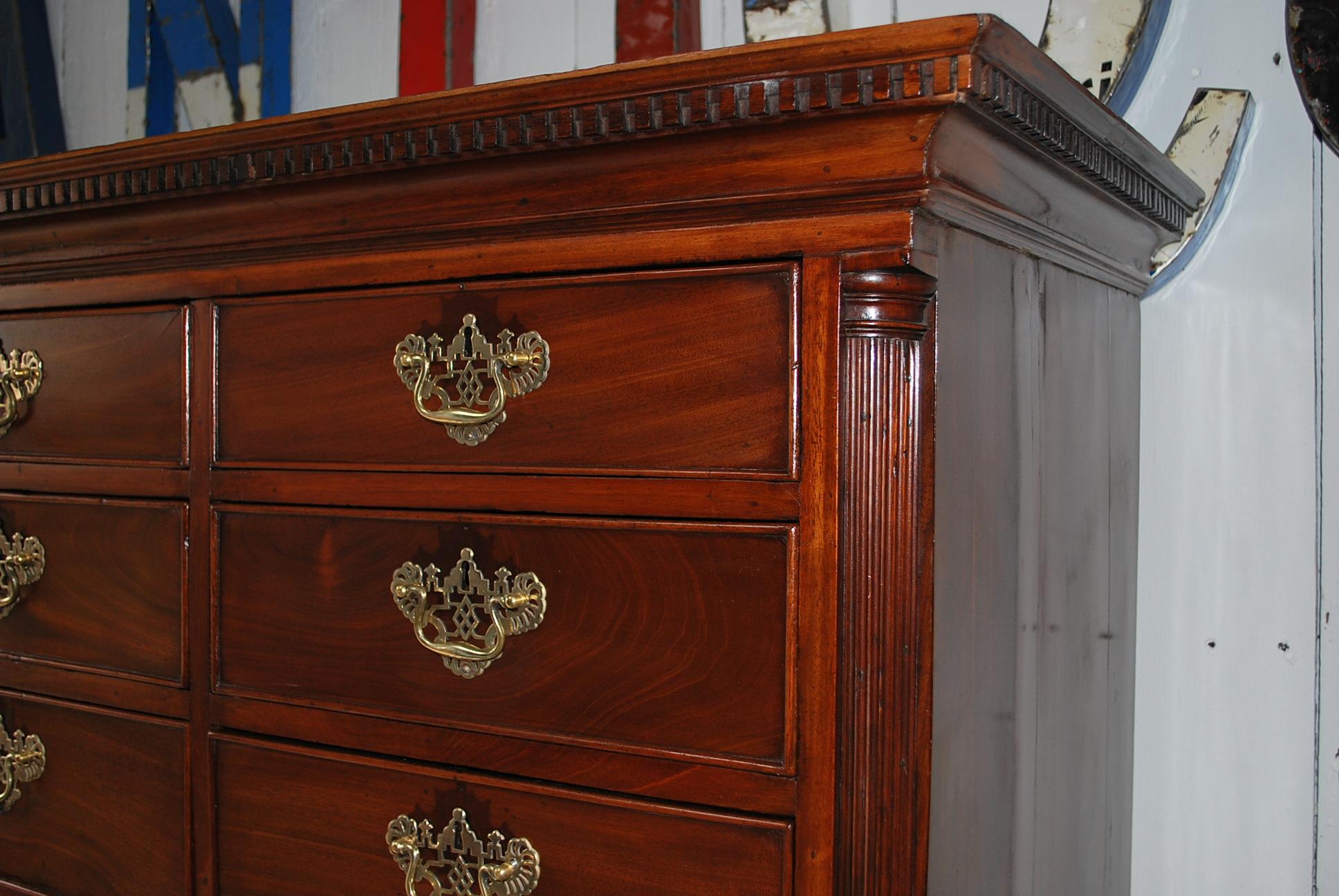 This is a rare and unusual Chippendale period mahogany tallboy / chest on chest. Standing on bracket feet with a dentil cornice. This is a very unusual piece to have these quoin decoration going up the corners, which is attributed to the Lancashire