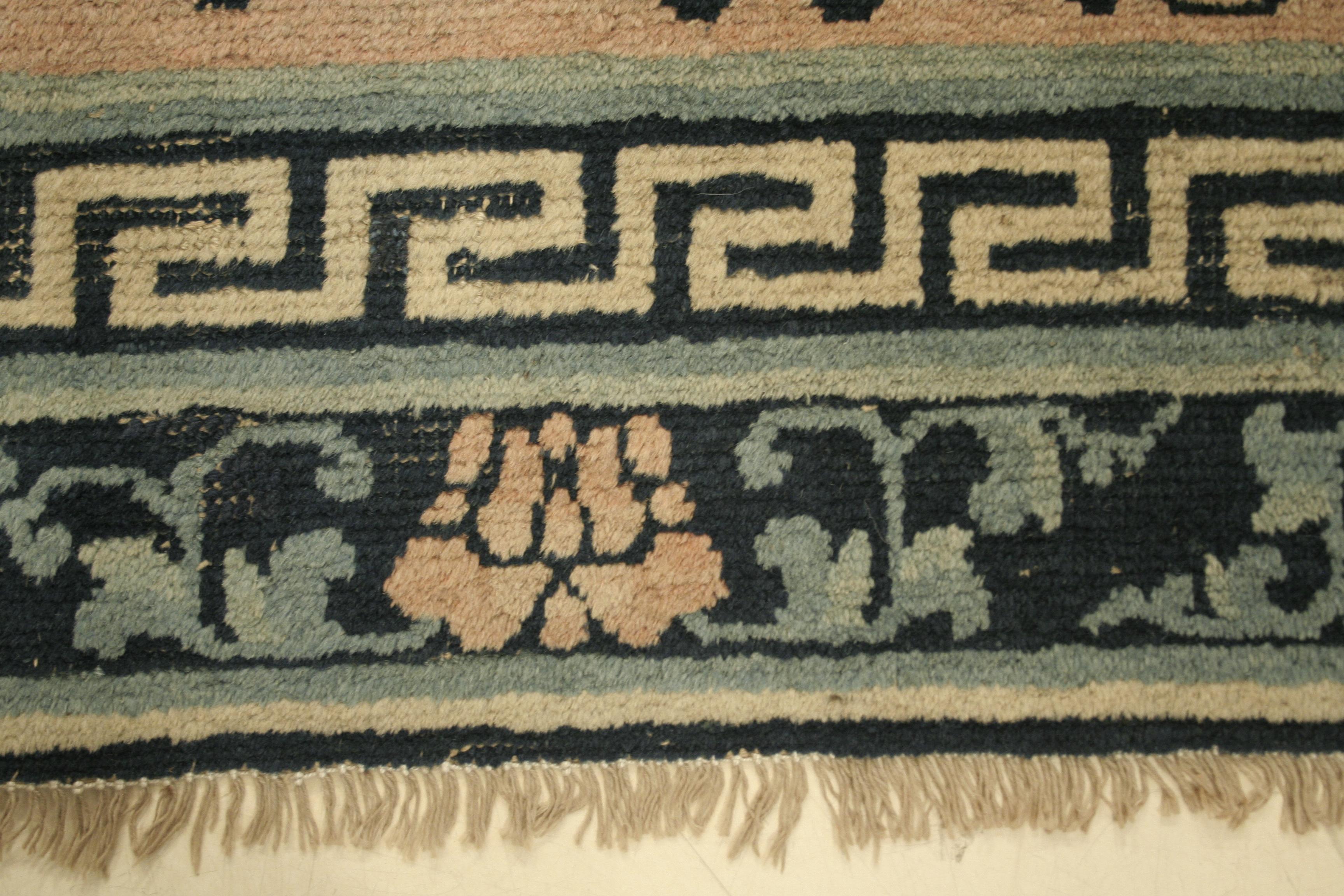 Ming Rare Antique Chinese Ningxia Rug with Blue Lotus Flowers on a Blush Pink Field For Sale