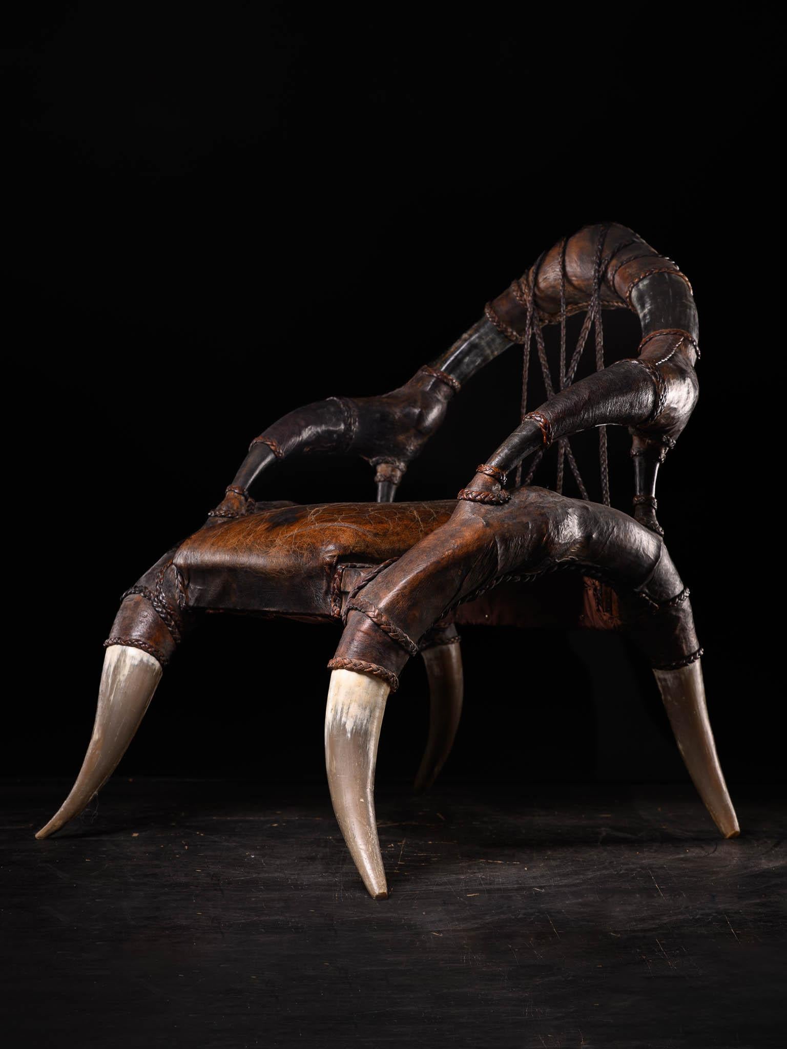 This beautiful colonial chair made of horn and leather is African in origin and dates  from the early 1900. Despite its age, this chair is in perfect condition, has a beautiful use-patina and is extremely comfortable.A true work of art and