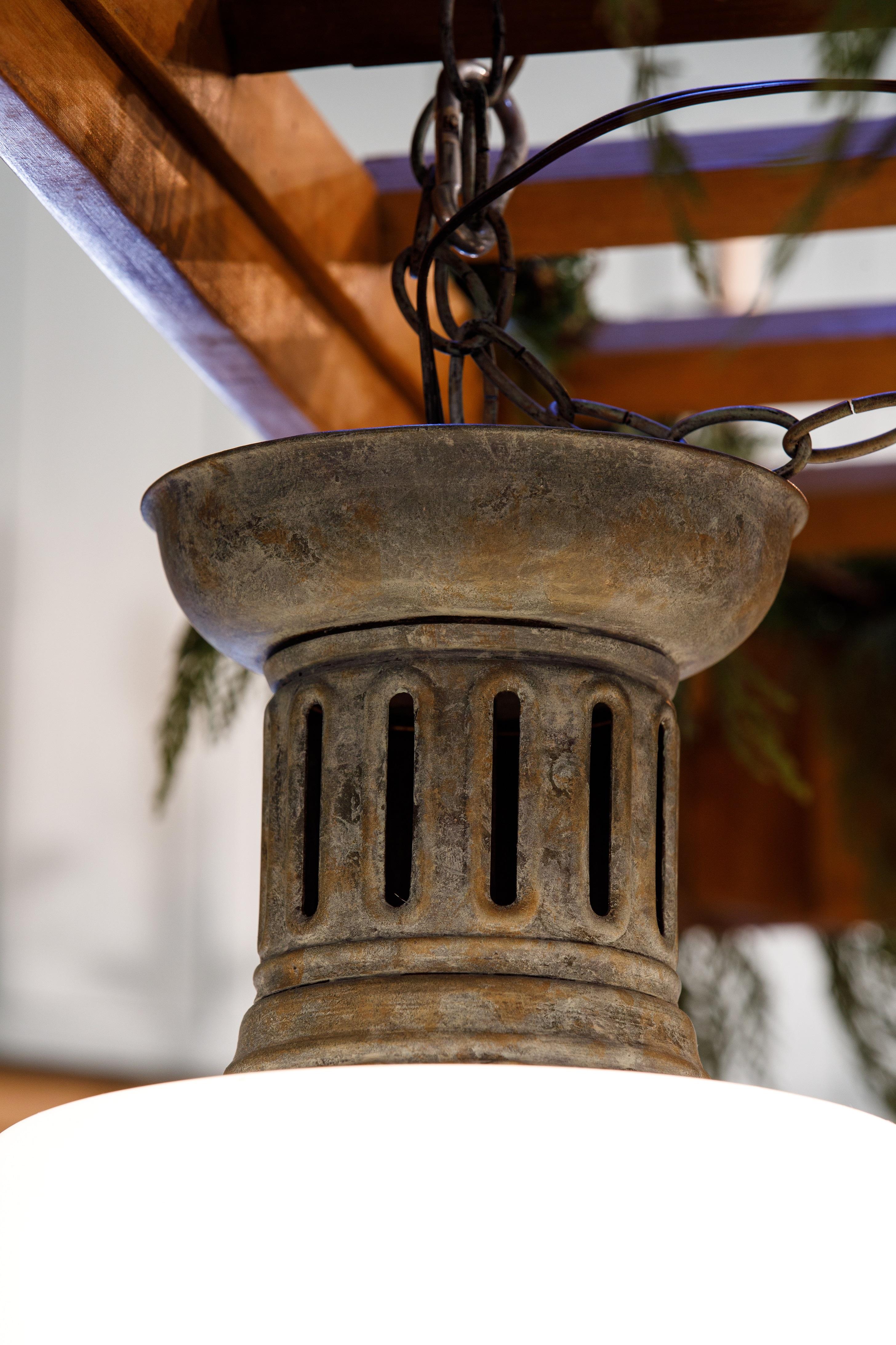 These antique copper and true milk glass (opaline) lights are unusual and I think interesting. 
The patina of the copper is beautiful. There are only two of these and when they are gone, they are gone. The price is for each. Suppose they have a bit