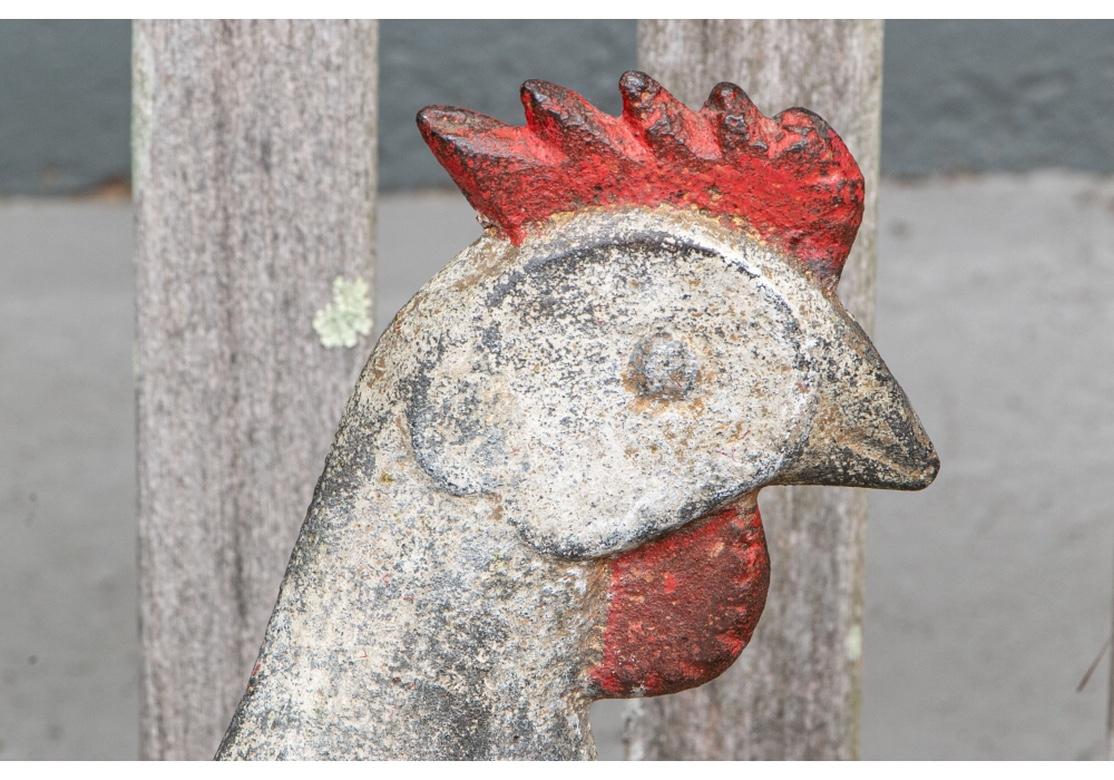 This rooster form weight was for a 10 foot wheel and was used as a counter balance on the windmill weight. Has original box cover. made by the Elgin Wind, Power & Pump Co, Elgin, Il., circa 1880-1920. In old paint original condition. 
Dimensions:
