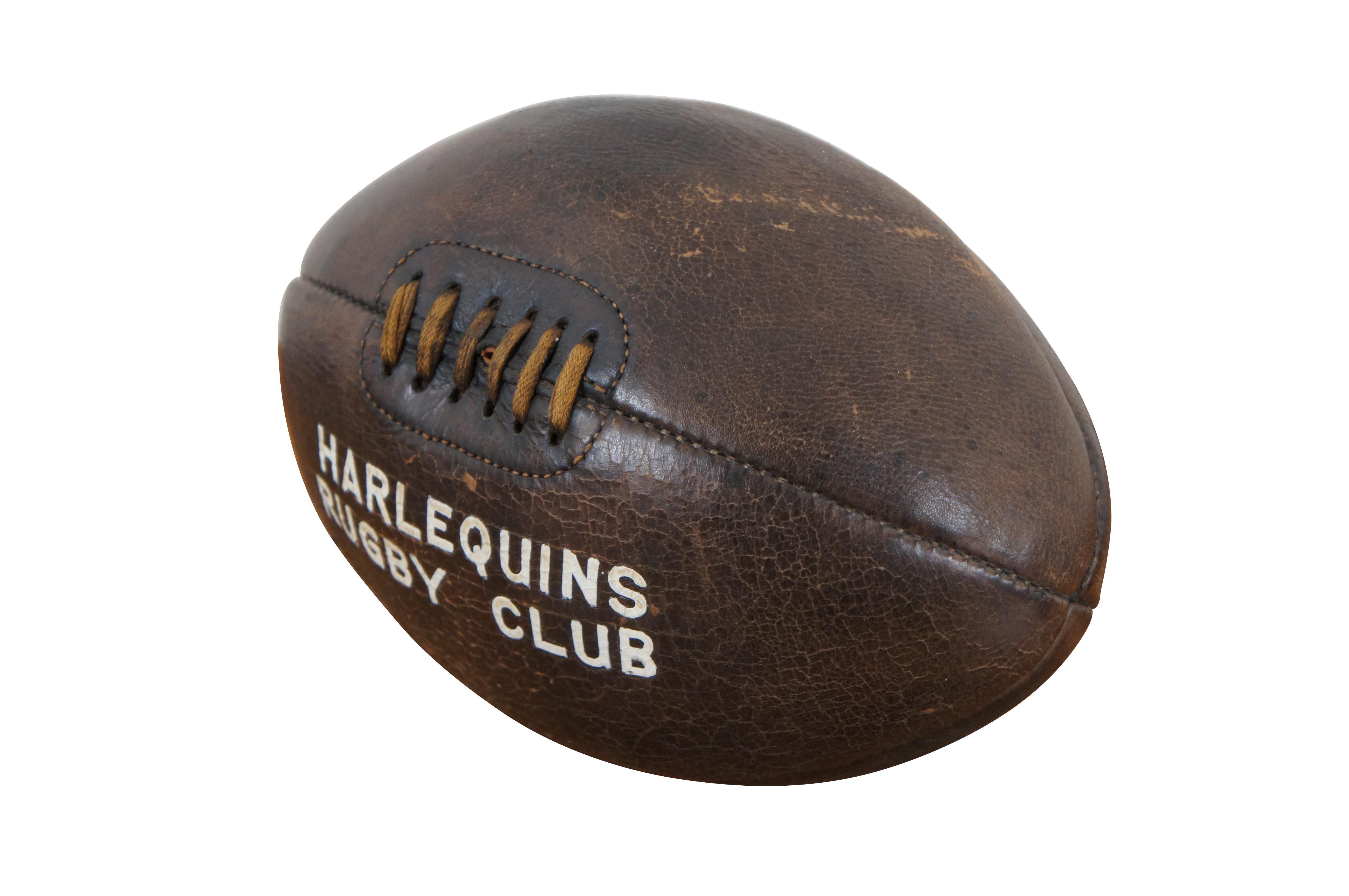 Rare antique early four panel leather rugby ball with cotton laces. Marked Harlequins Rugby Club.

Harlequins (officially Harlequin Football Club) is a professional rugby union club that plays in Premiership Rugby, the top level of English rugby