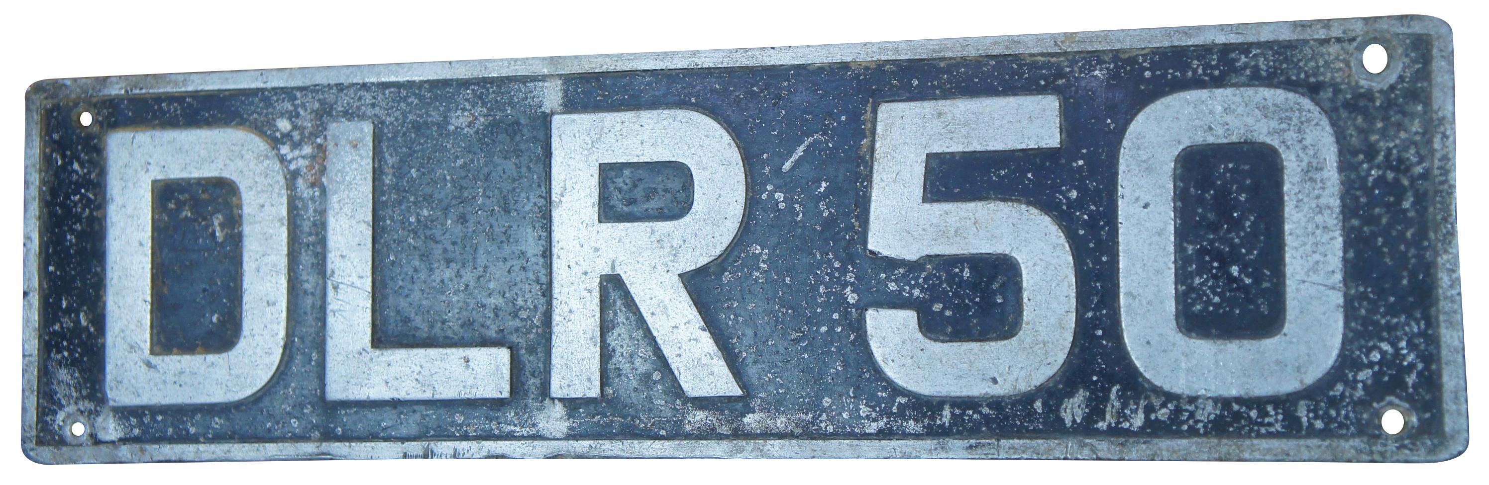 Rare antique European dealer license plate with the initials DLR and number 50.
 