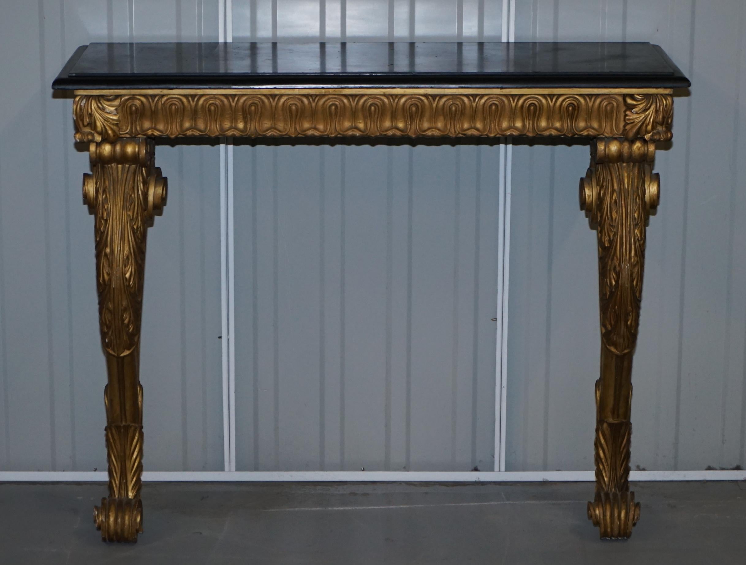 We are delighted to offer for sale this lovely French giltwood with black marble top console table circa 1860 Paris

A very good looking and well made piece with nice gilding to the frame, the marble top is thick, bevelled and nicely cut, its used