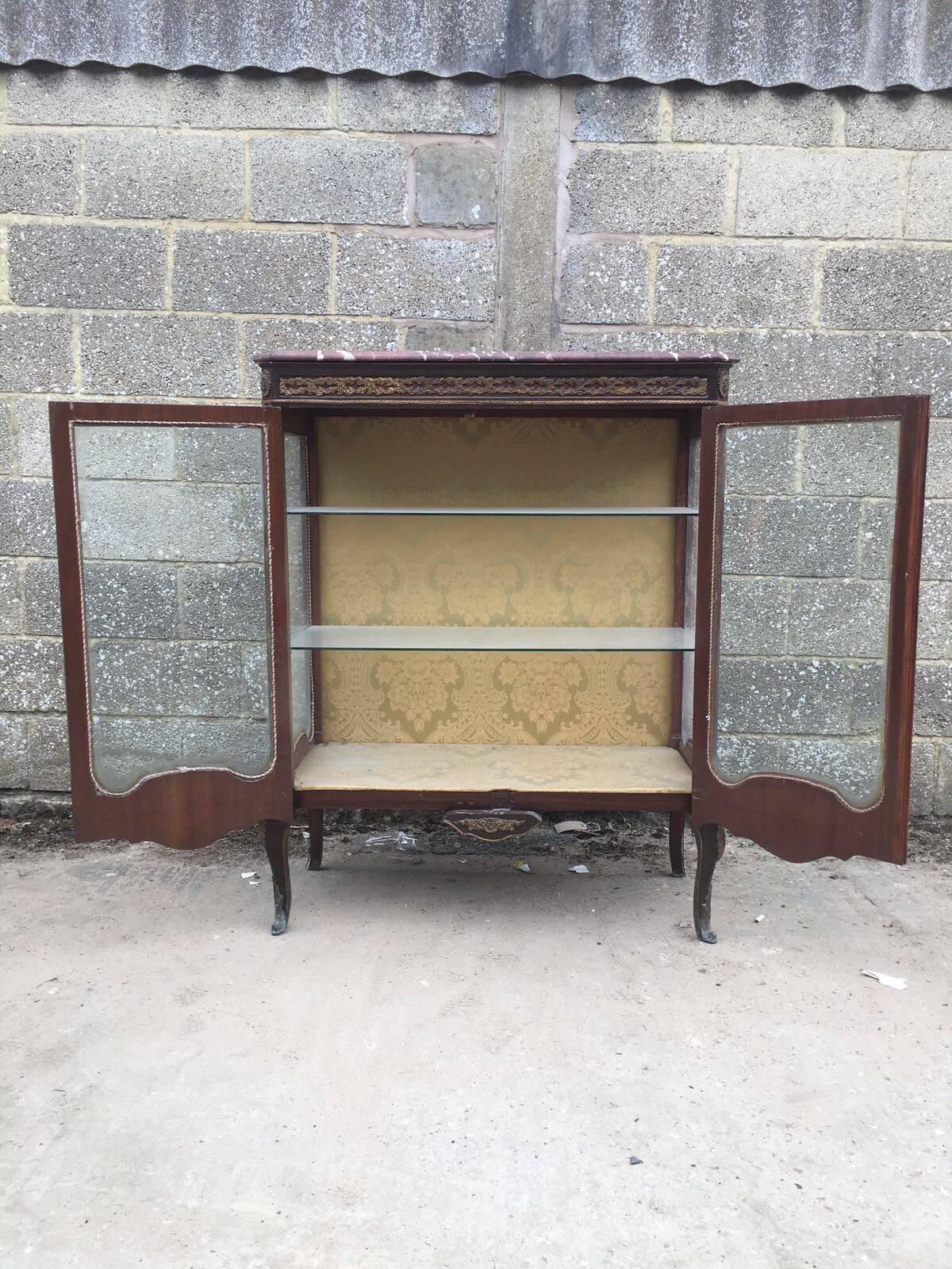 Here we have a very unusual display cabinet with glass doors and shelves. Very nice size and in lovely condition for its age.

Dimensions- 106cm wide, 131cm tall, 46cm deep.

 

See my other ads for more french furniture.