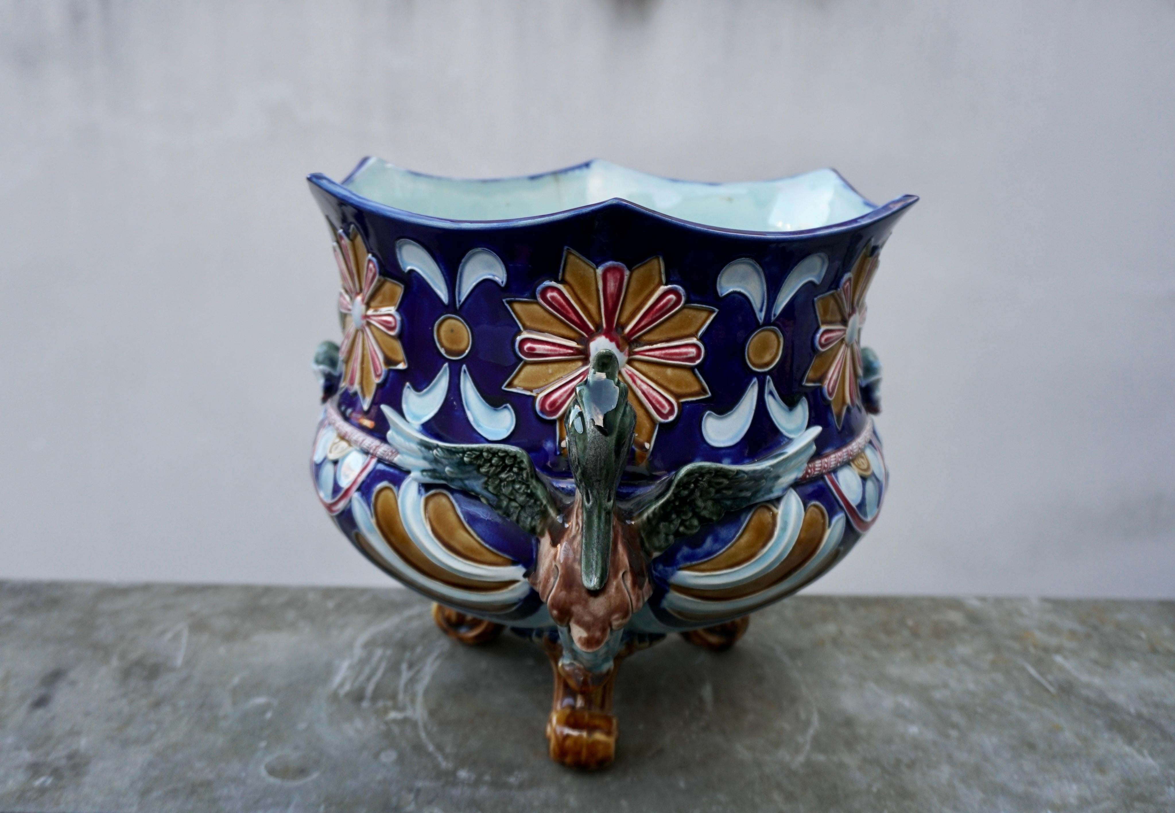 Glazed Rare Antique French Majolica Planter Jardiniere with Winged Griffins and Flowers For Sale