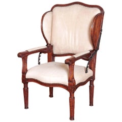 Rare fauteuil français ancien à dossier inclinable et dossier à oreilles