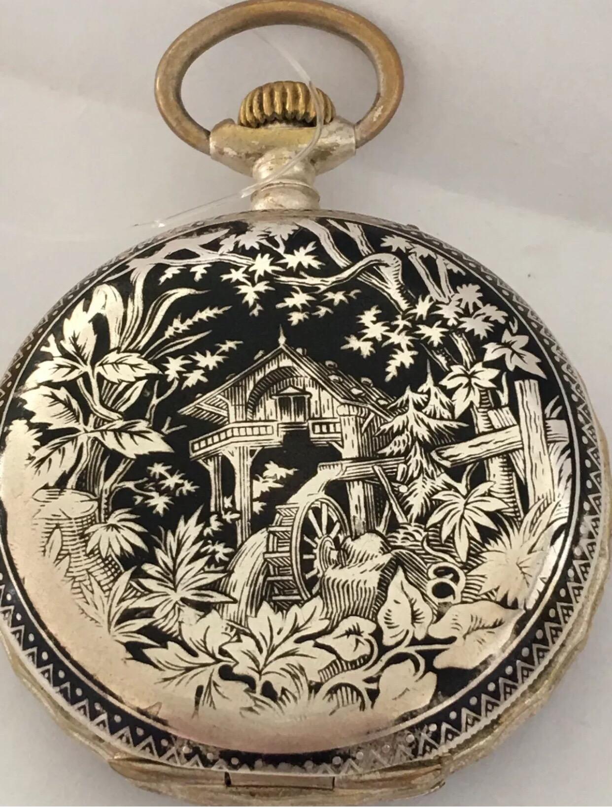 
Rare, Antique Full Hunter Silver & Niello case Moonphase Calendar Pocket Watch.


This Lovely good quality stem-wind watch is in good working condition and ticking well. Beautiful Niello work of art depicting a Watermill house on one side and a