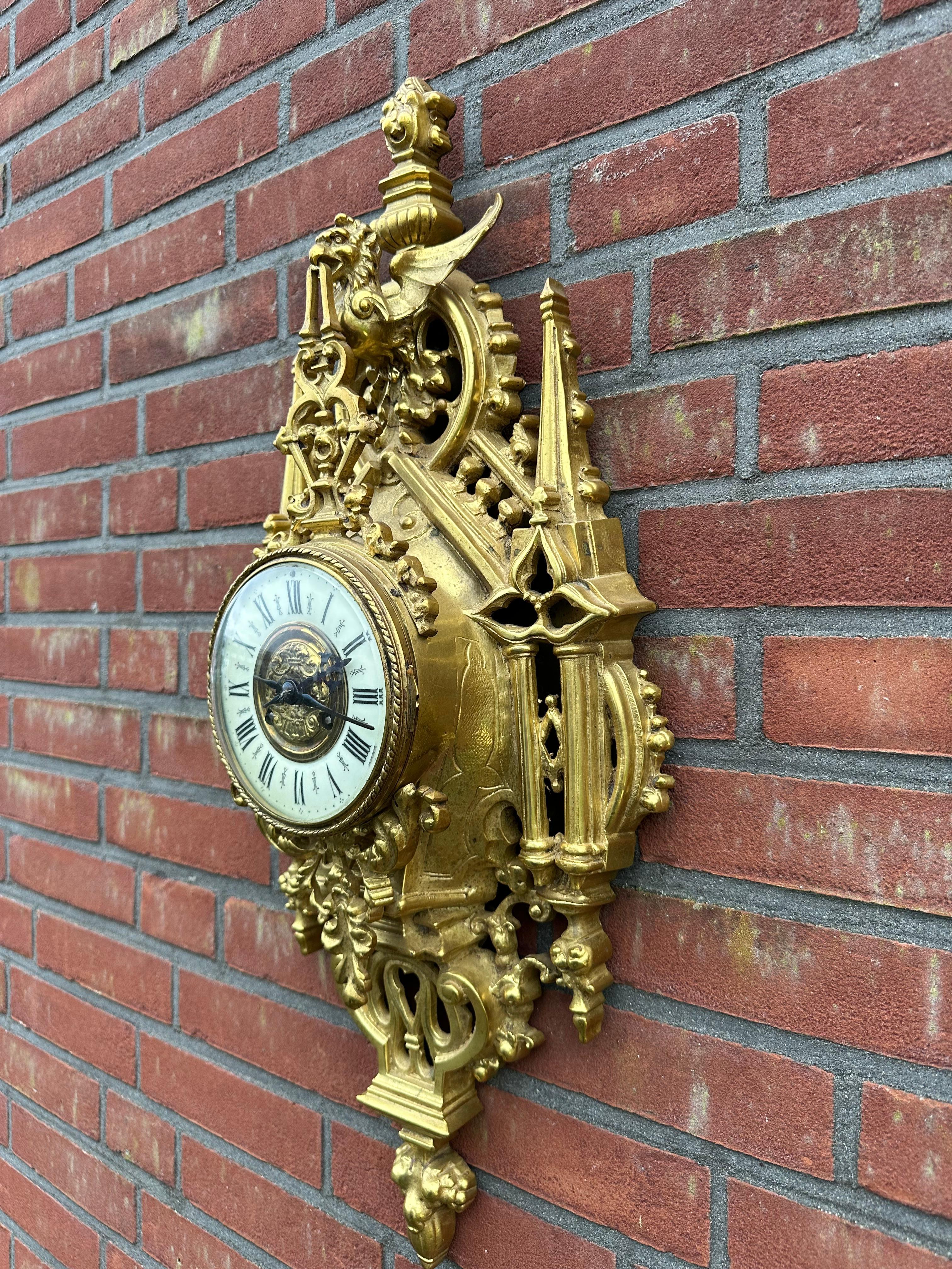 Stunning and perfect running Gothic architectural design bronze wall clock, from circa 1880.

If you like rare antiques in general and one of a kind clocks in particular then this handcrafted specimen for wall mounting could be the perfect addition
