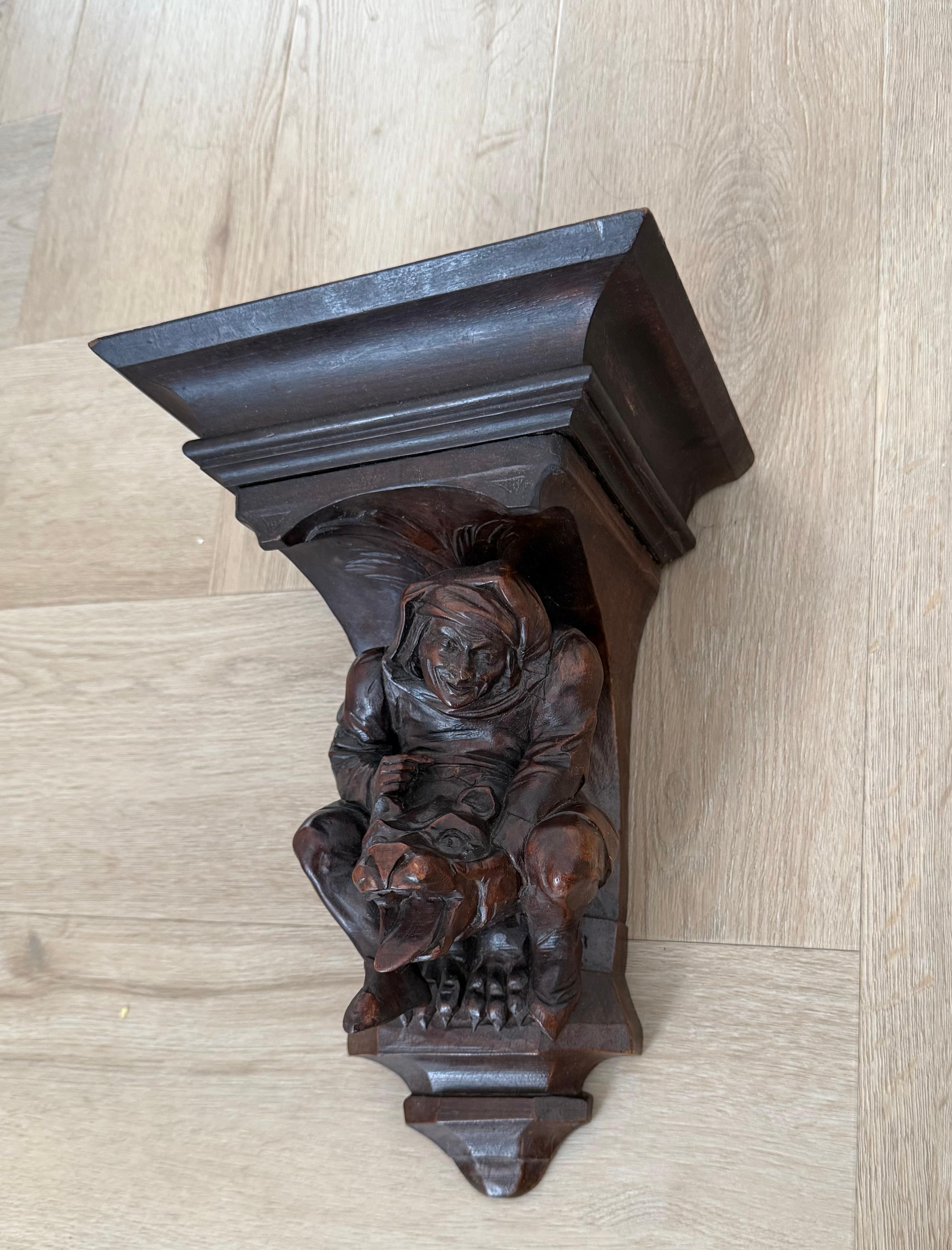 Stunning and deeply carved nutwood, Gothic Art wall bracket, Corbel.

If you are a collector of rare and striking Gothic antiques then this bracket could be the perfect addition to your collection. This all handcrafted and marvelously hand carved,