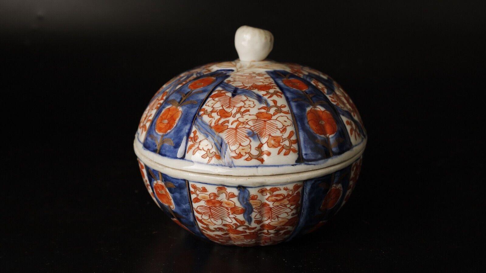 Very Fine and Rare Early Hand-Painted Imari Porcelain Covered Bowl

This very fine and rare early hand-painted Imari porcelain-covered bowl is a stunning example of Japanese craftsmanship. It is from the late Edo period, 18th-19th century. The bowl