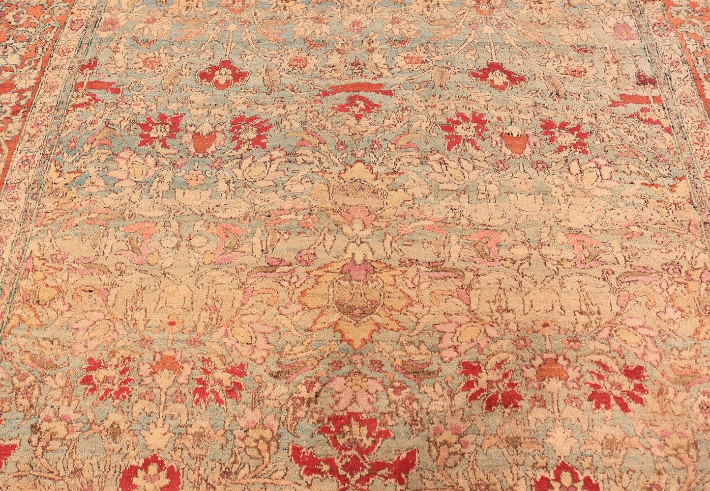 Beautiful floral antique room size Indian Agra rug, country of origin: India, date circa 1880. Size: 10 ft 3 in x 14 ft 4 in (3.12 m x 4.37 m)

This magnificently beautiful rug would at first appear to be Persian or perhaps even a French rug, but