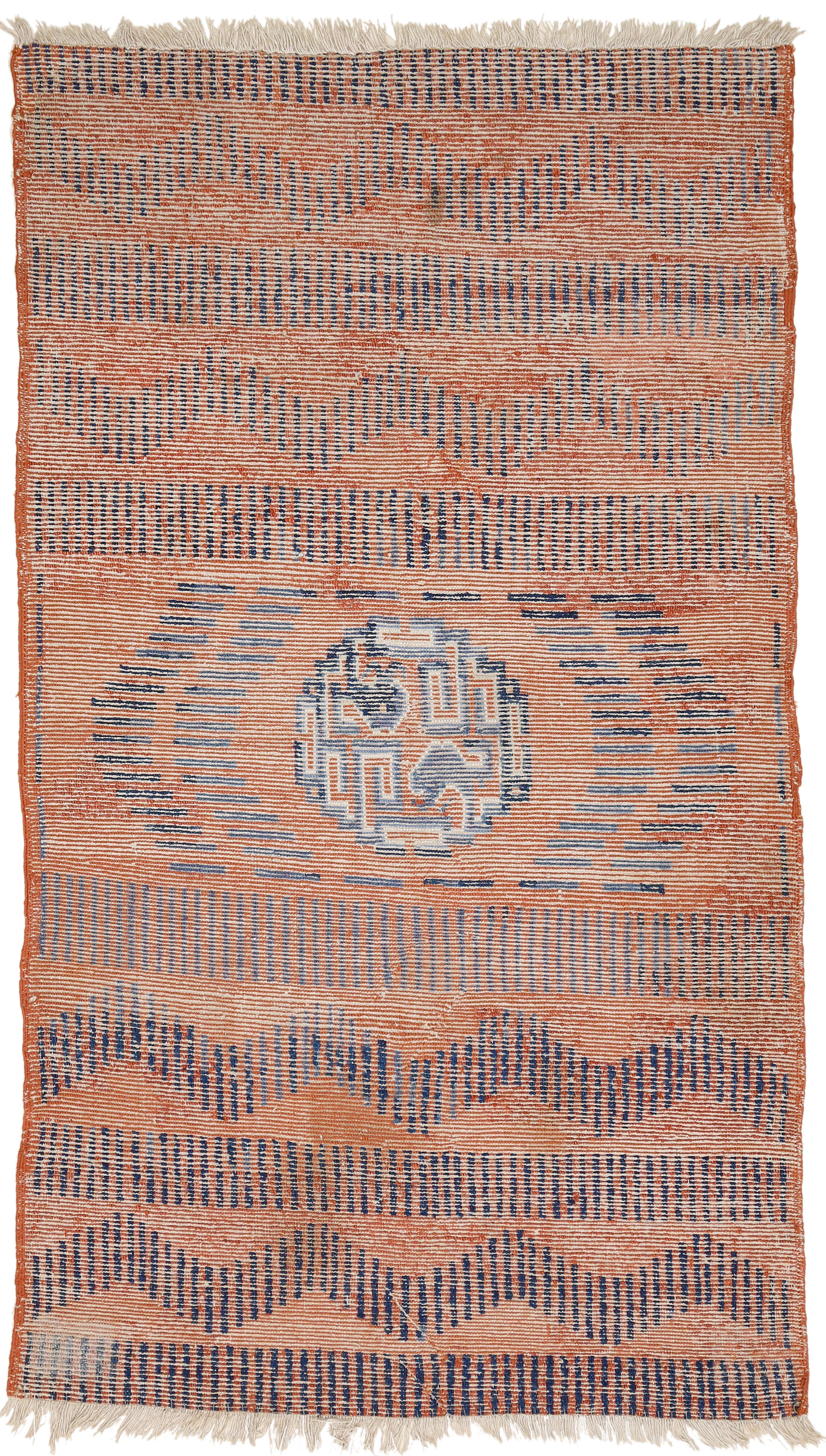 This rug belongs to a small group of weavings recently defined as RKO because of their distinctive design, consisting of a sequence of bands with strokes and dashes that are reminiscent of the sonic sound waves present on the logo of the RKO motion