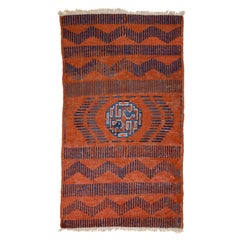 Rare Antique Kansu Rug with Tiger Pelt Pattern and Confronting Dragons