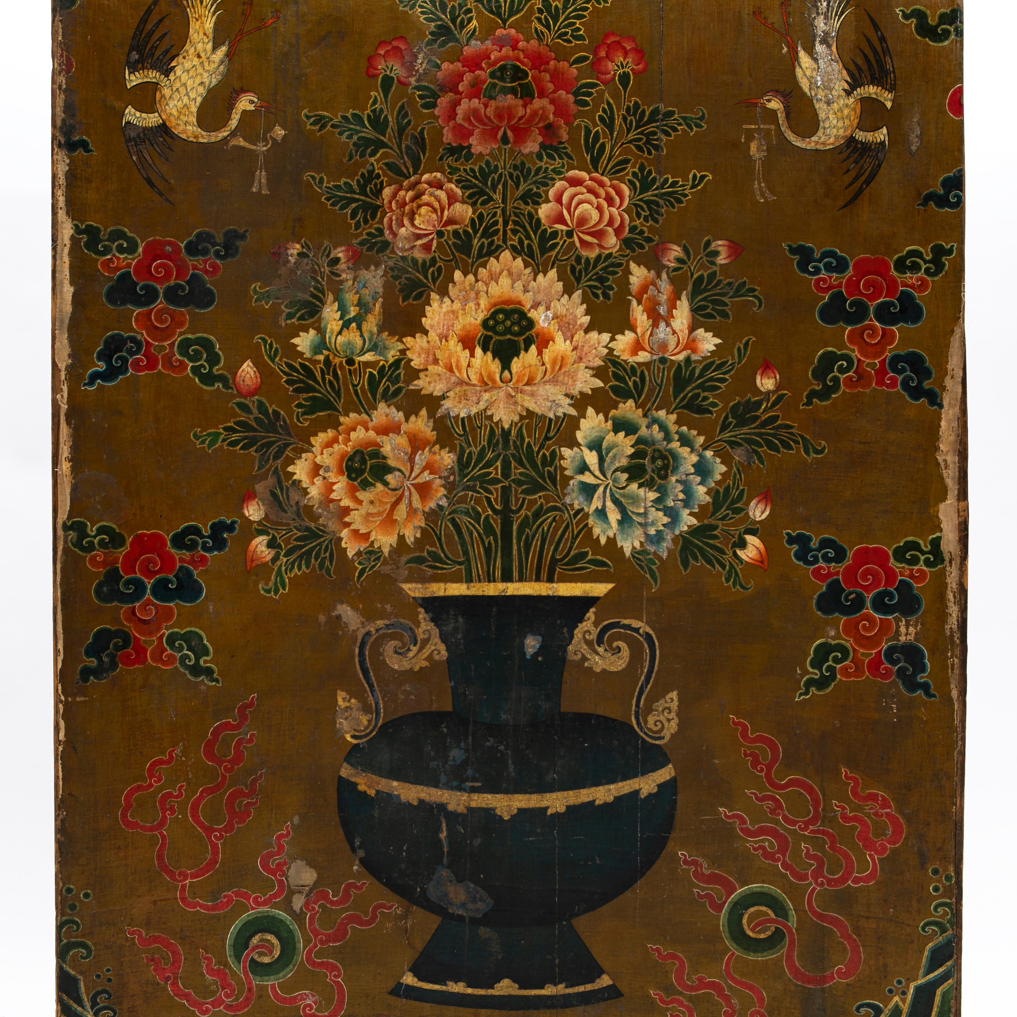 Large Ming dynasty period painting, China 1365-1644.
Oil or tempera painted on thin canvas (or silk), mounted on wood. The painting displays a vase of flowers in the middle, a phoenix bird in each corner and waves at the bottom.

Very decoratively