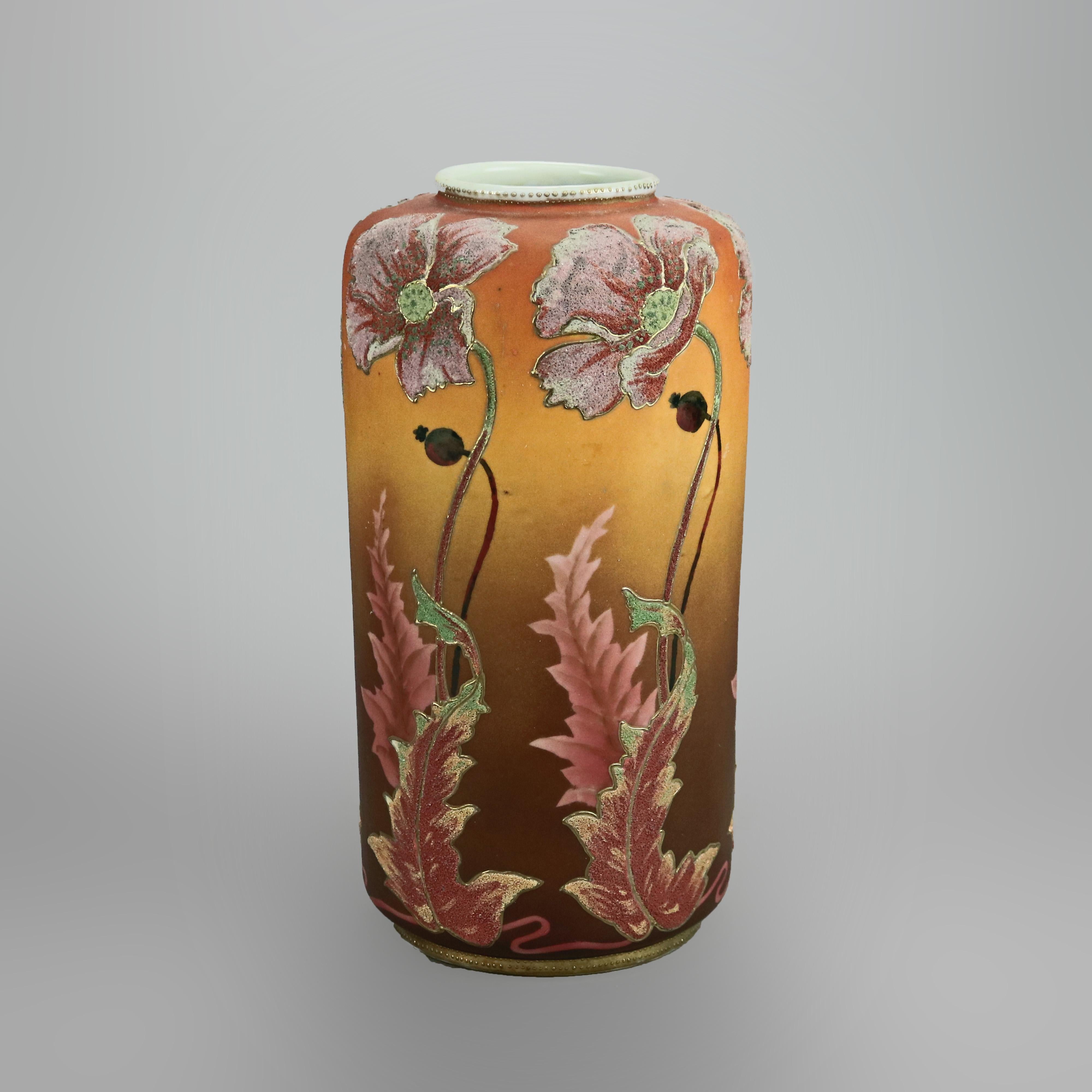 An antique and rare Japanese Nippon Coraline porcelain vase offers hand painted flowers with gilt highlights, signed on base, drilled for lamp base, c1910

Measures- 12.25'' H x 6.5'' W x 6.5'' D.