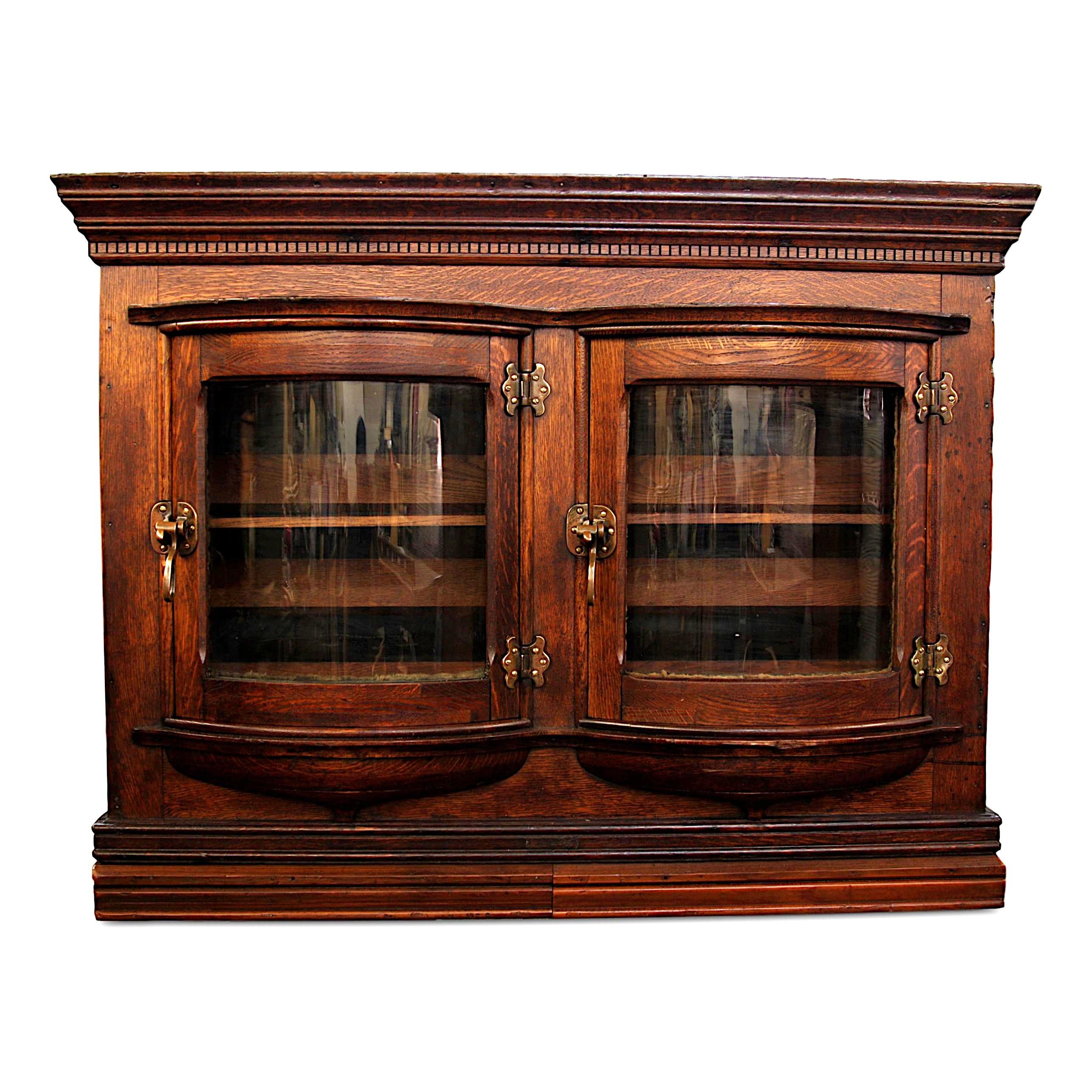 This is a rare and wonderful antique general store display case/ice box. Ice box features a gorgeous quarter-sawn, solid oak case with raised panels, solid brass hardware, and amazing curved-glass, 