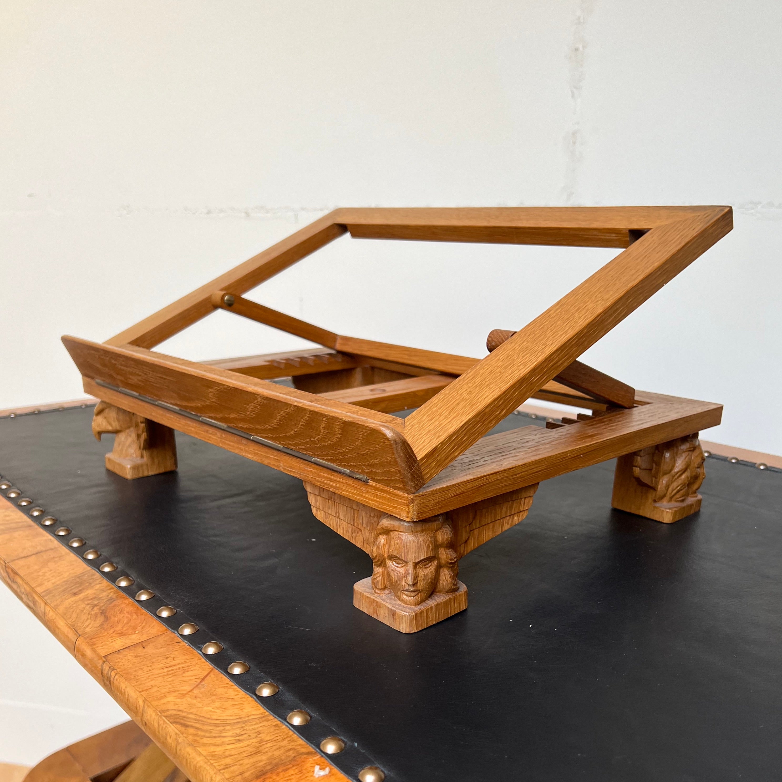 One of a kind and fully adjustable, church book stand.

This unique and hand carved antique Gothic Revival bible stand is of museum quality and condition. All handcrafted out of solid tiger oak only, this stand dates back to the early years of the