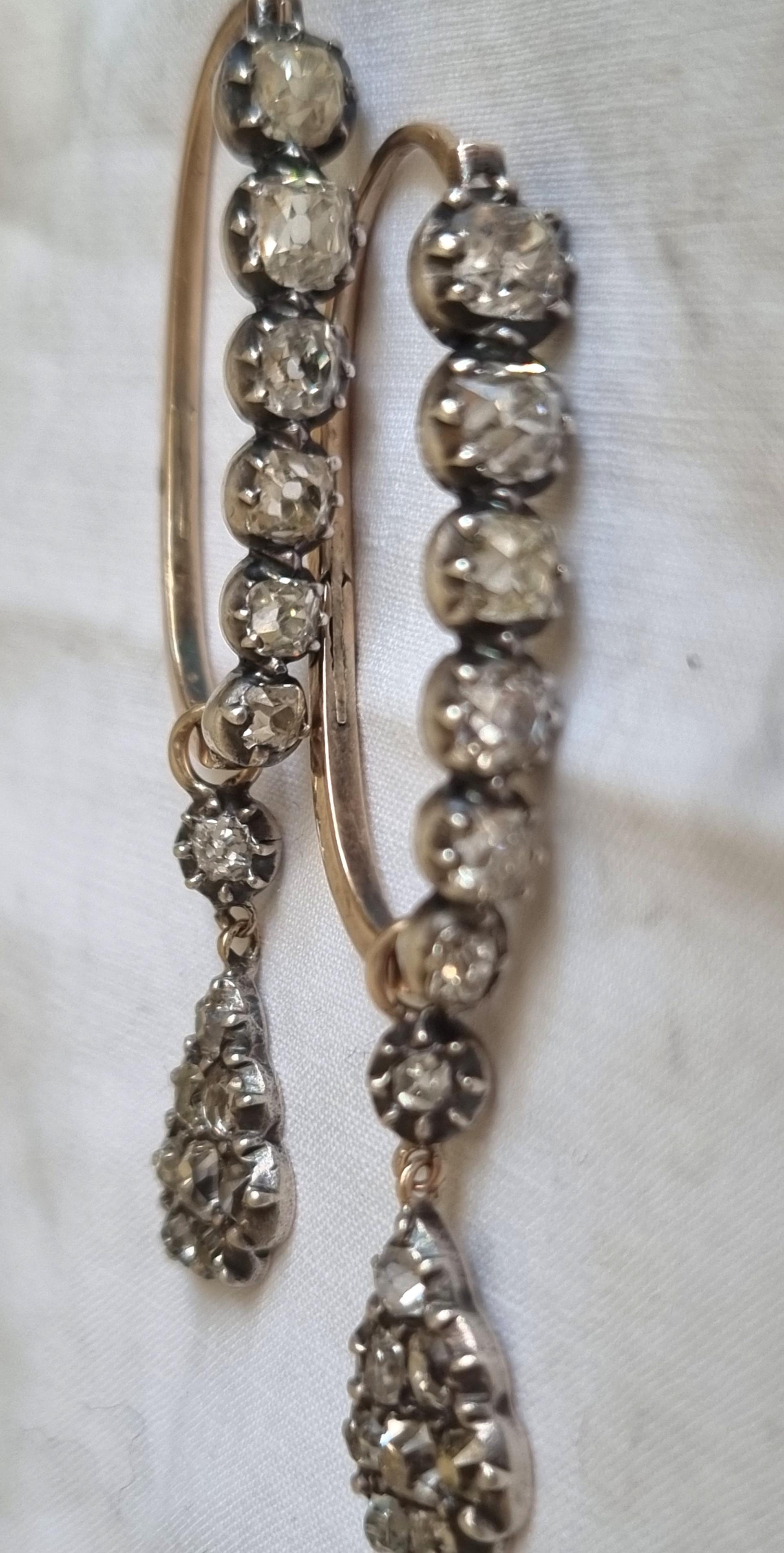 MAGNIFICENT PAIR OF GEORGIAN POISSARDE DIAMOND EARRINGS, Diamonds bright and lively. Extremely rare to find a pair of diamond poissarde earrings like this.
Antique Pair of  Early 19th Century Old Mine Cut Diamond Dangle Drop Hoop Earrings. 
Antique