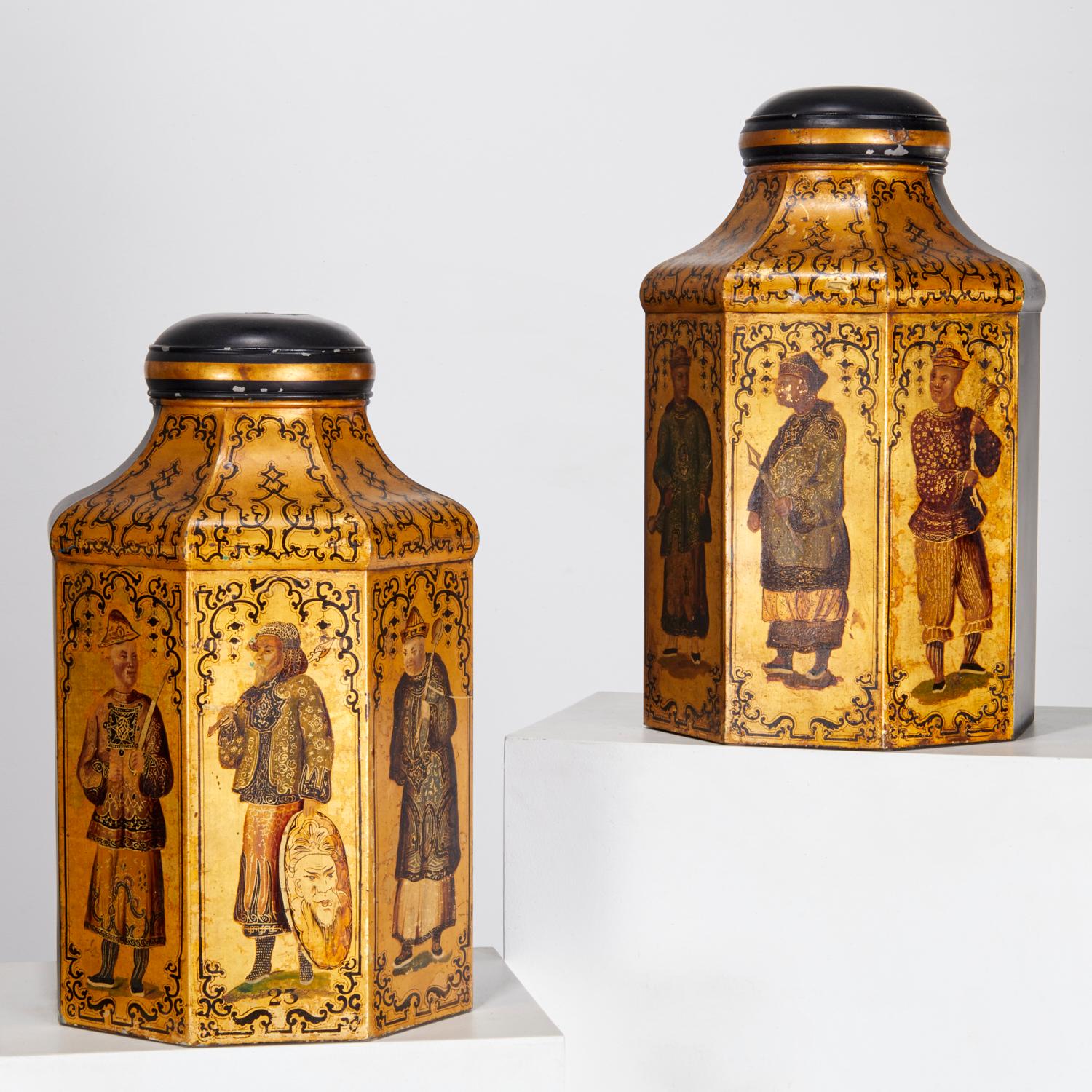 19th C. Victorian England. 19th c., England, a rare pair of very large gilt, polychrome and black painted metal tea cannisters. These Victorian tole tea canisters are stunning examples of 19th-century craftsmanship. Often used for decorative storage