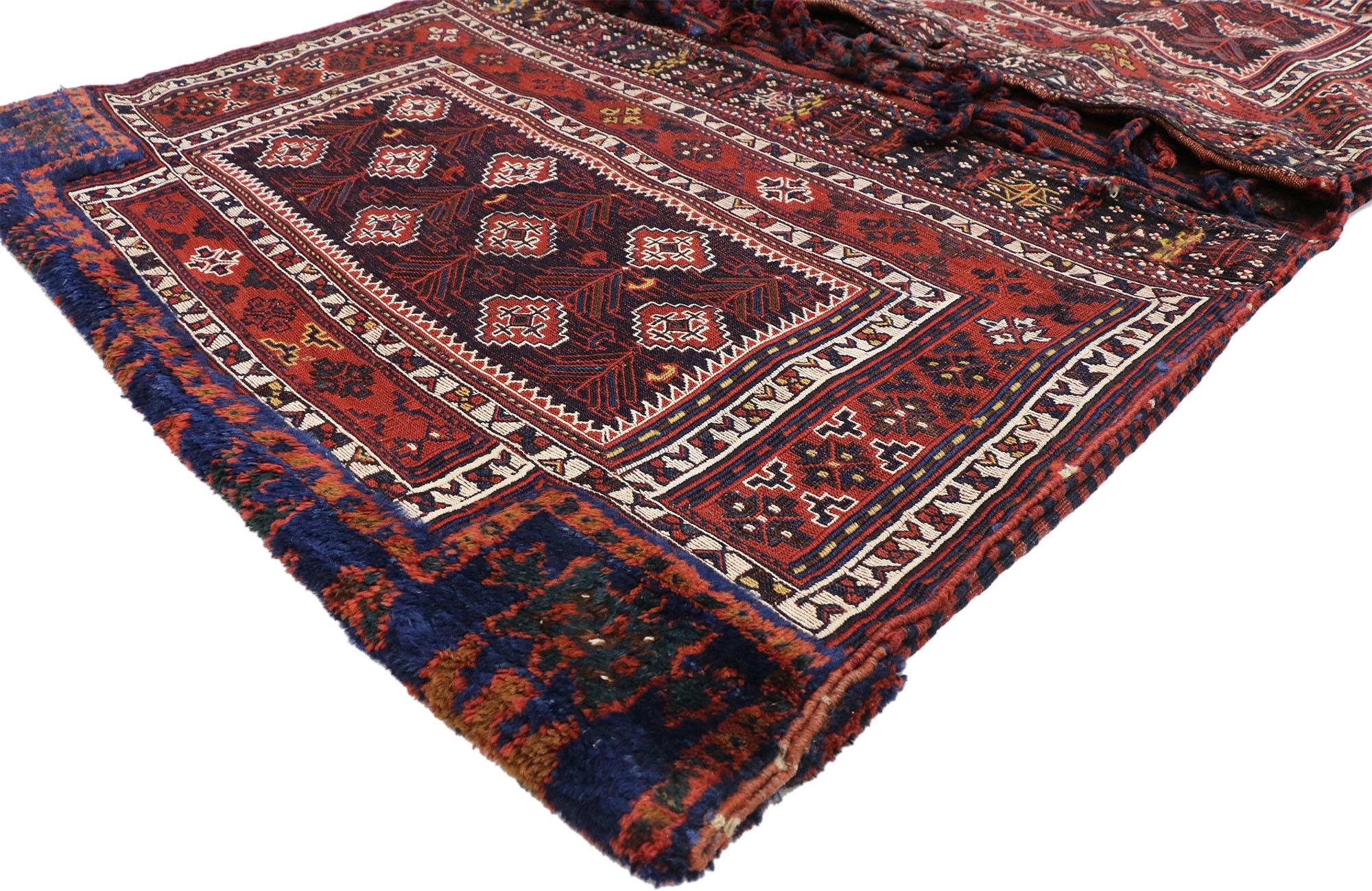 Tribal Rare Antique Persian Soumak Saddlebag, Nomadic Charm Meets Versatility For Sale