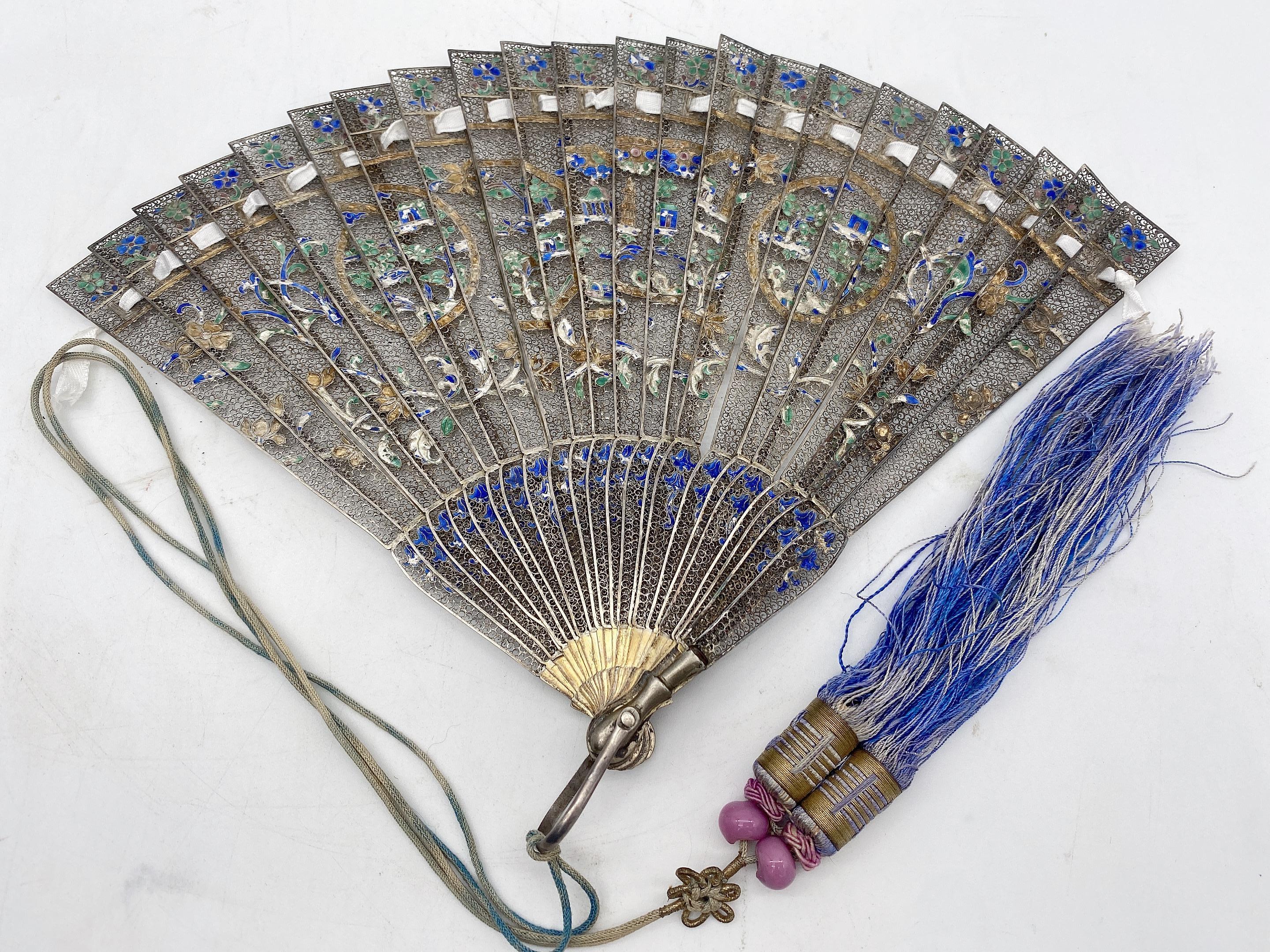 Rare Fine Antique early 19th century Chinese gilt silver filigree and enamel brise fan , Qing dynasty, the fan has 22 sticks with a 18k gold ring loop , wonderful sticks with silver wire filigree and enamel blue , green and yellow in both sides ,