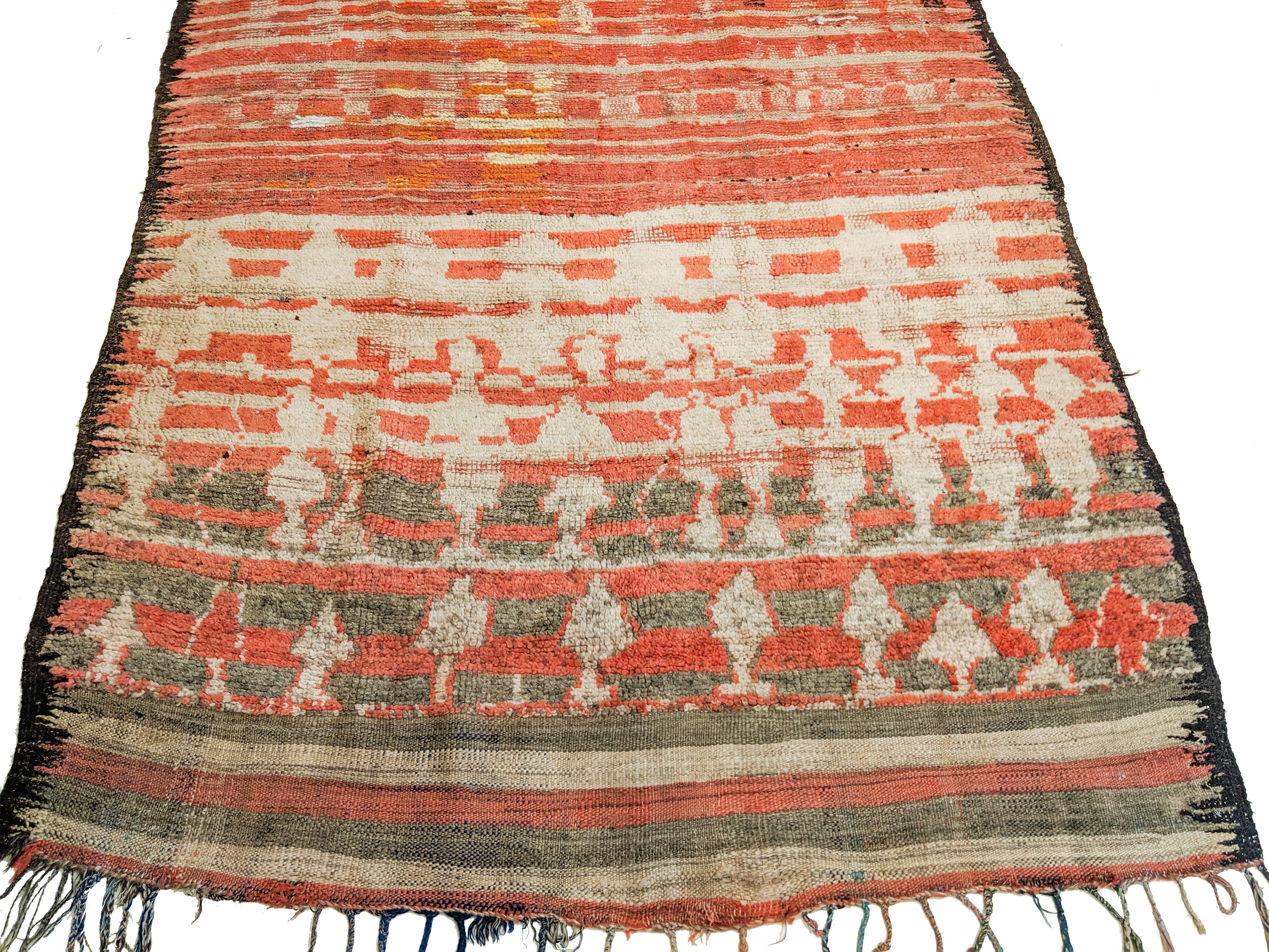 One of the oldest Berber rugs I have personally ever handled, woven in mixed technique with the upper section in flat-weave embellished with some knotted pile and the lower portion completely knotted. The abstract pattern is characteristic of the