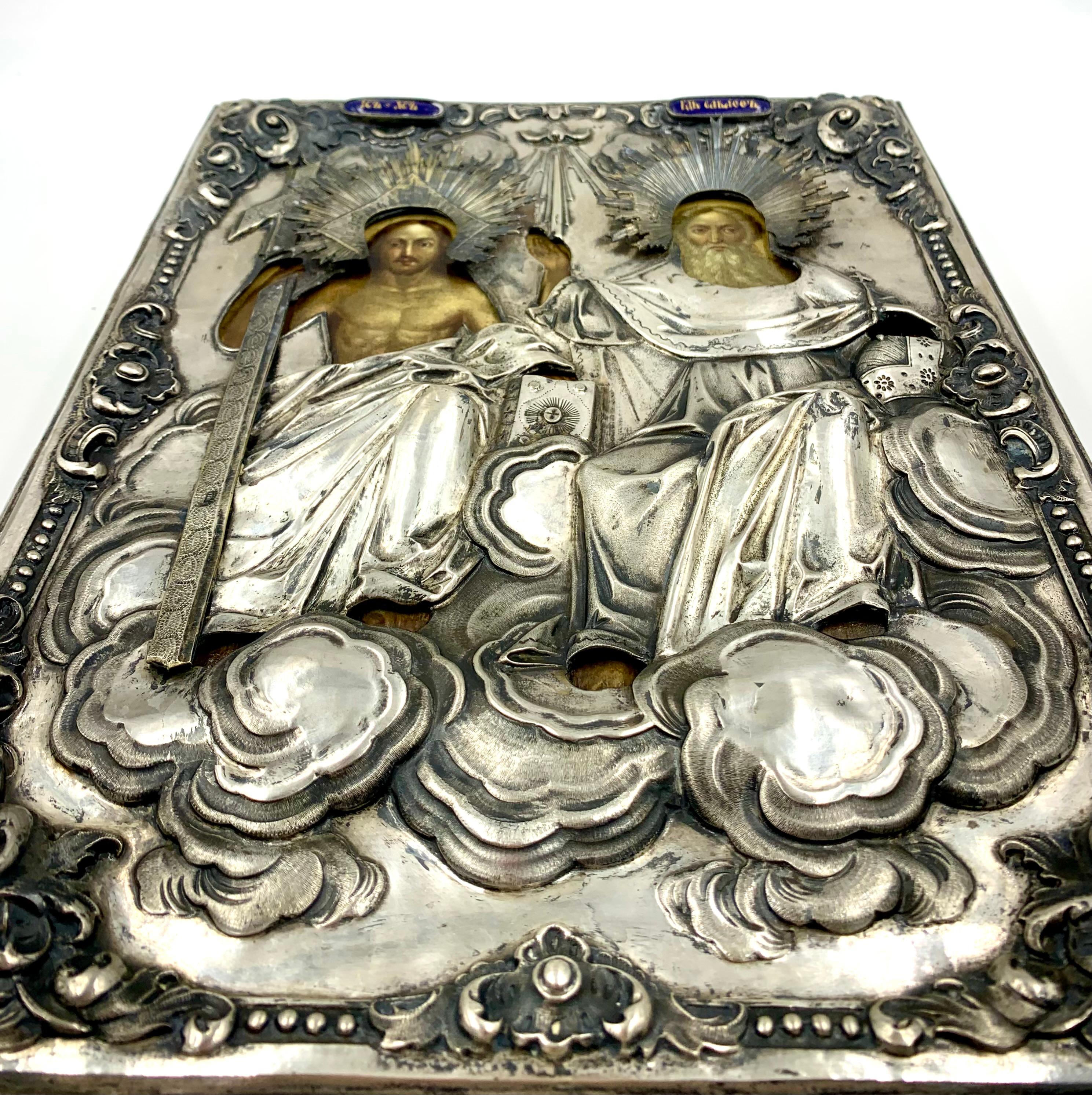 Fine and rare antique Russian silver and enamel Holy Trinity icon
Moscow, 1853
Marks: Cyrillic D O maker's mark, A C assay master's mark for Aggey Grigorievich Svechin ( Postnikova-Loseva, p.252, #622), 1853, 84, Saint George slaying the Dragon city