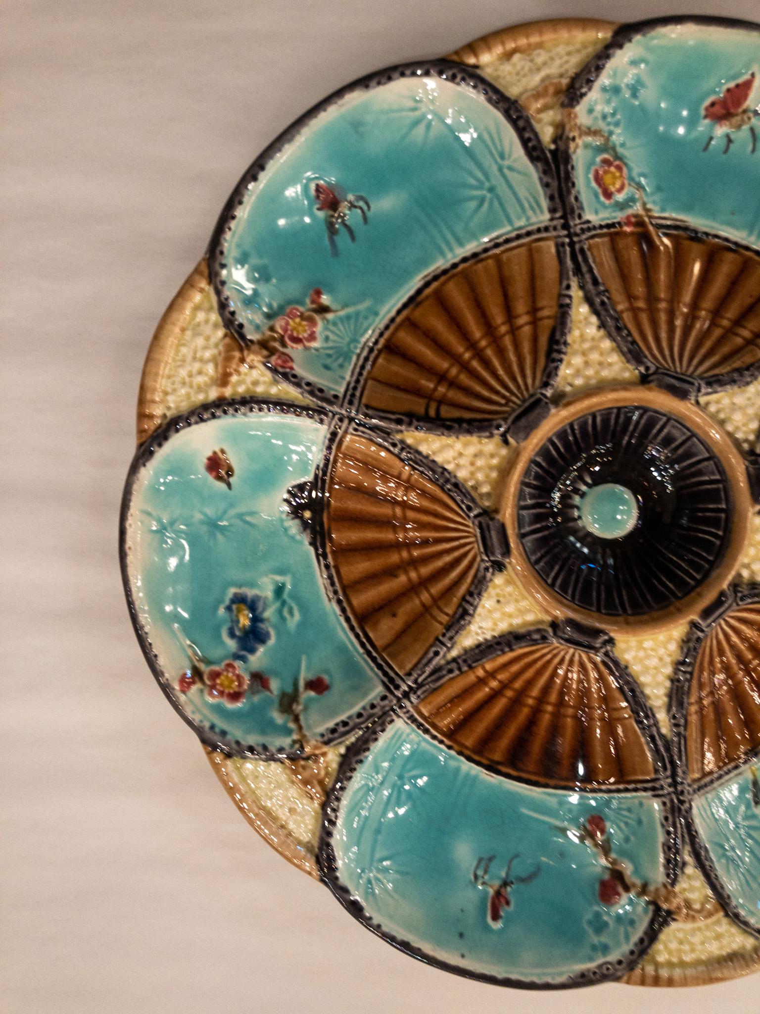 Rare antique S. Fielding aesthetic movement oyster plate circa 1890s in Asian floral fan design.