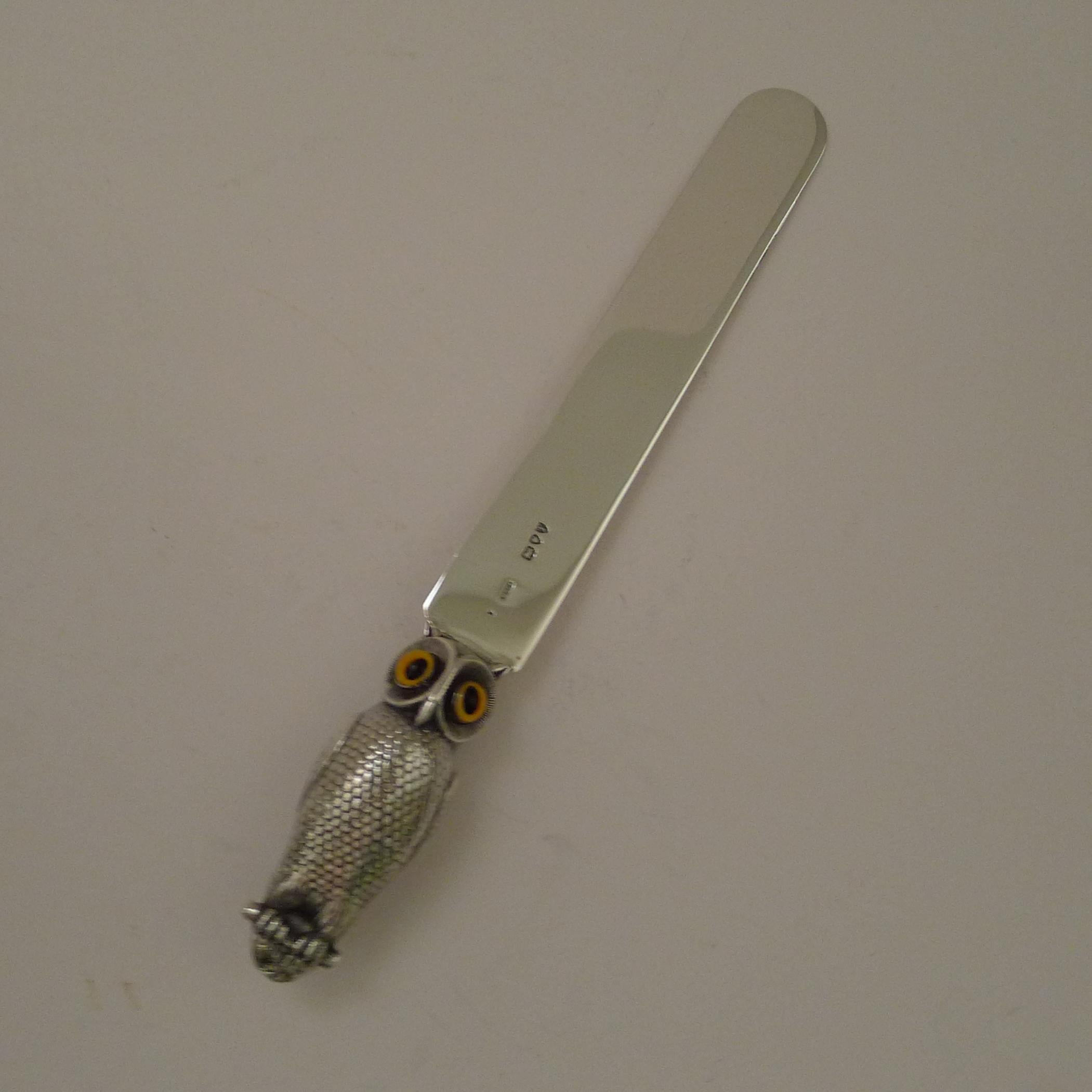 A magnificent and rare piece of Sampson Mordan solid / sterling silver in the form of a paperknife with a novelty handle in the form of an owl with two fabulous original glass eyes.

Just back from our silversmith where we had any scratches removed,