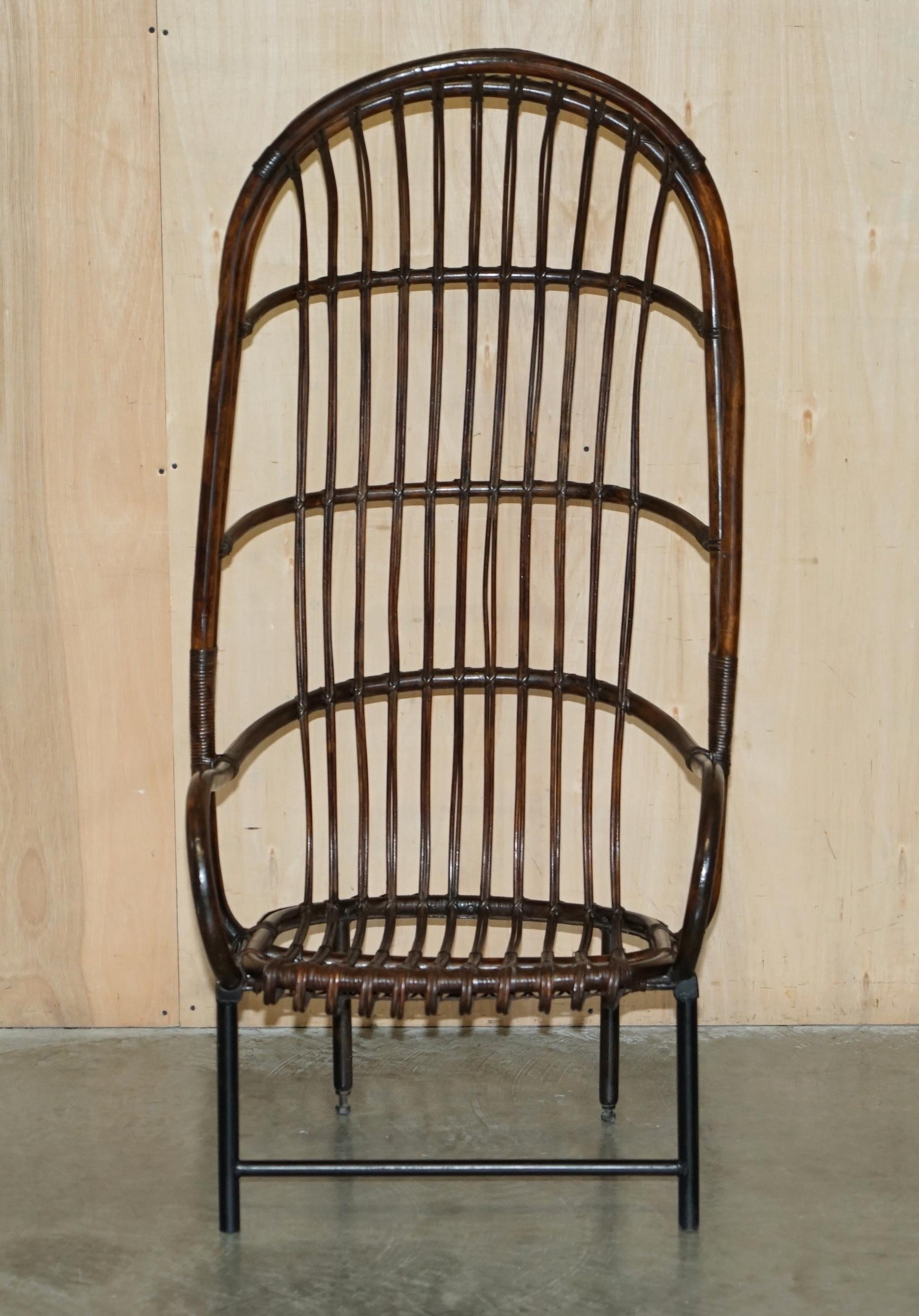 Royal House Antiques

Royal House Antiques is delighted to offer for sale this super rare, highly collectable, fully sized Thonet Bamboo Porters wingback armchair with steel weighted base frame 

Please note the delivery fee listed is just a guide,