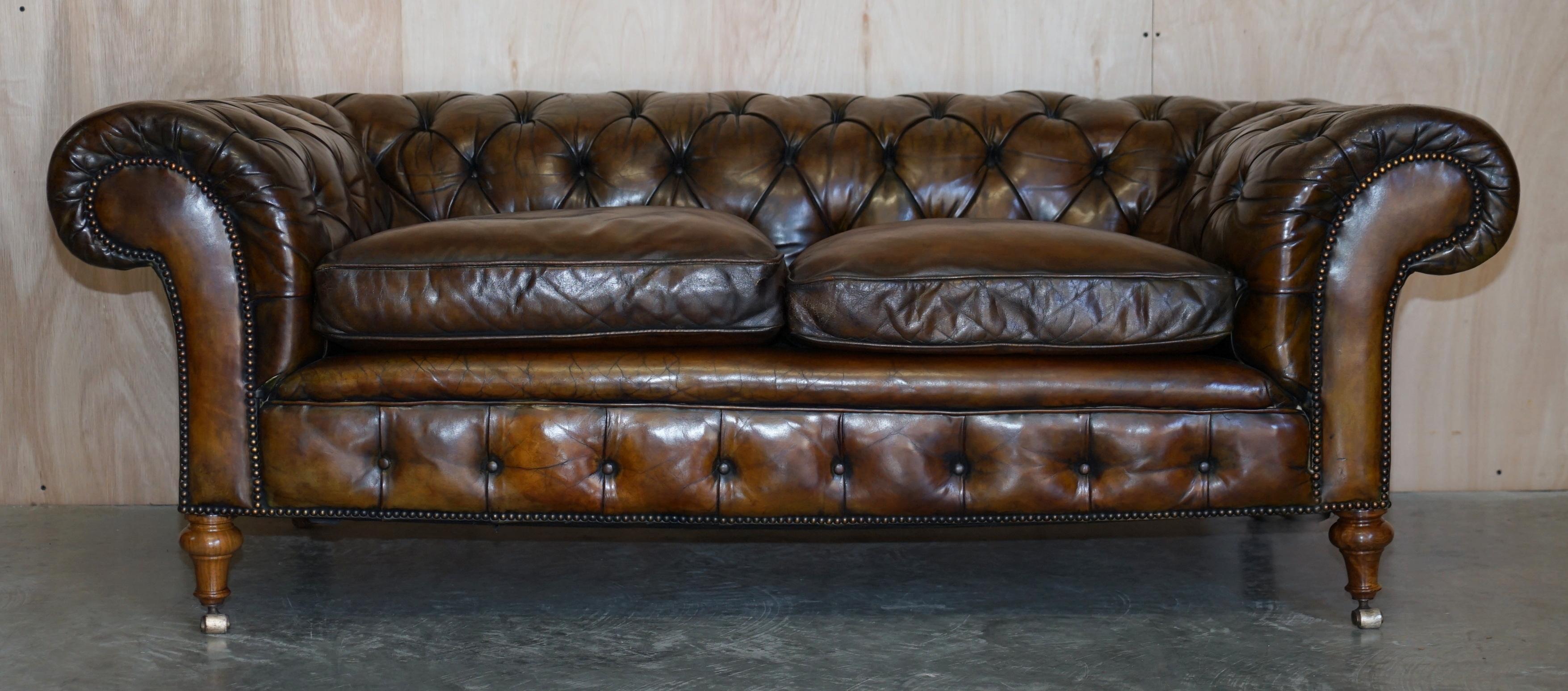 We are delighted to offer for sale this stunning fully restored Victorian hand dyed cigar brown leather Chesterfield tufted club sofa with feather filled cushions and super rare one of a kind Rosewood turned legs with super brass castors.

I have