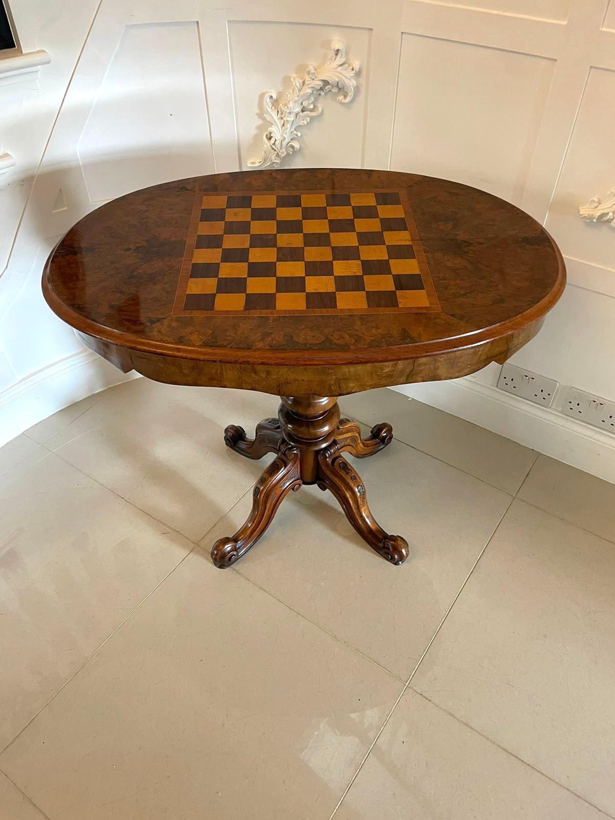 Rare antique Victorian quality figured walnut patent games table by Wilson & Co having a quality oval figured walnut lift off top with a thumb moulded edge and an inlaid chess board to the centre opening to reveal an unusual patent board game with