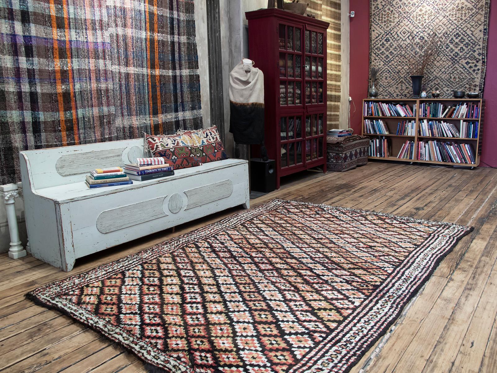 A rare antique tribal rug from Central Turkey, with thick, shaggy pile, originally meant to function as a bed in the weaver’s household - “yatak” means bed in Turkish.

Apparently quite old judging by its naturally dyed colors, it is also