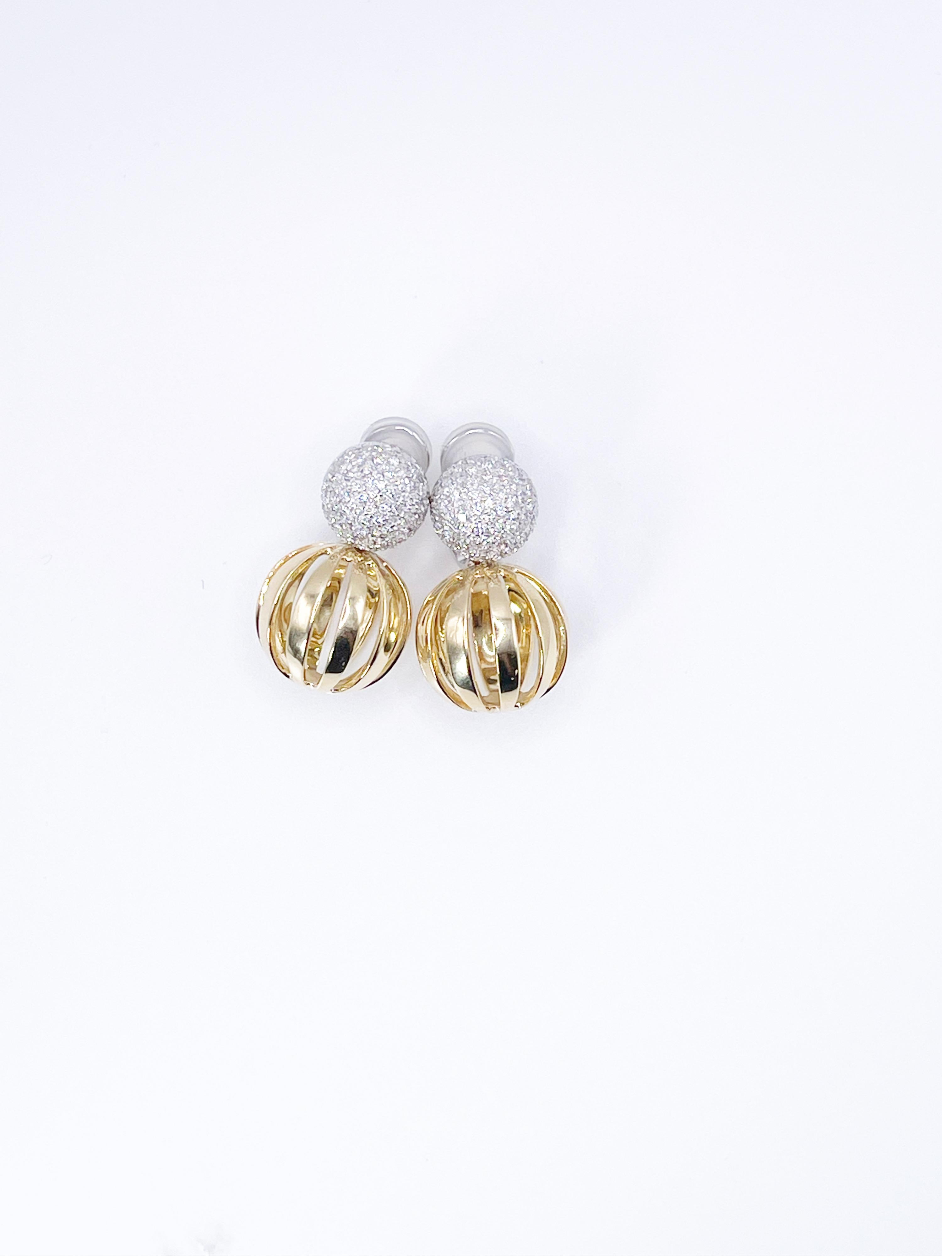 Stunning Antonini diamond earrings weighing 1.58ct made in 18KT white & yellow gold, natural VS diamonds and hand polished yellow gold circles complement any outfit. 
CENTER STONE: NATURAL DIAMONDS
CARAT: 1.58CT
CLARITY: VS
COLOR: F
CUT: ROUND