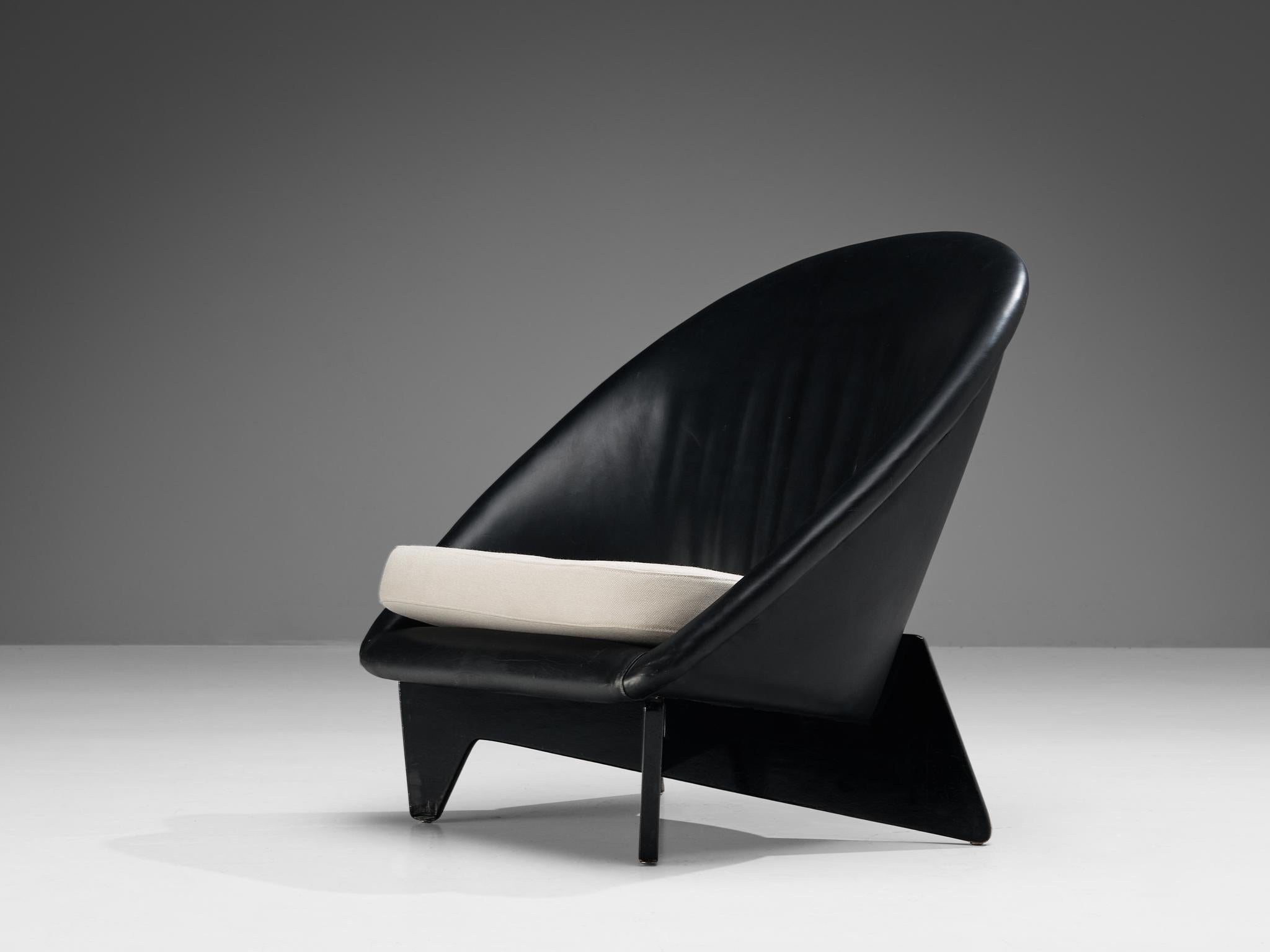 Antti Nurmesniemi for Palace Hotel, Helsinki, lounge chair, leatherette, fabric, lacquered birch, Finland, 1952 

In 1952, the distinguished Finnish designer Antti Nurmesniemi conceived this chair exclusively for the Palace Hotel, situated in the