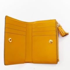 rare ANYA HINDMARCH 2014 Runway Coco Pops embossed leather folding wallet