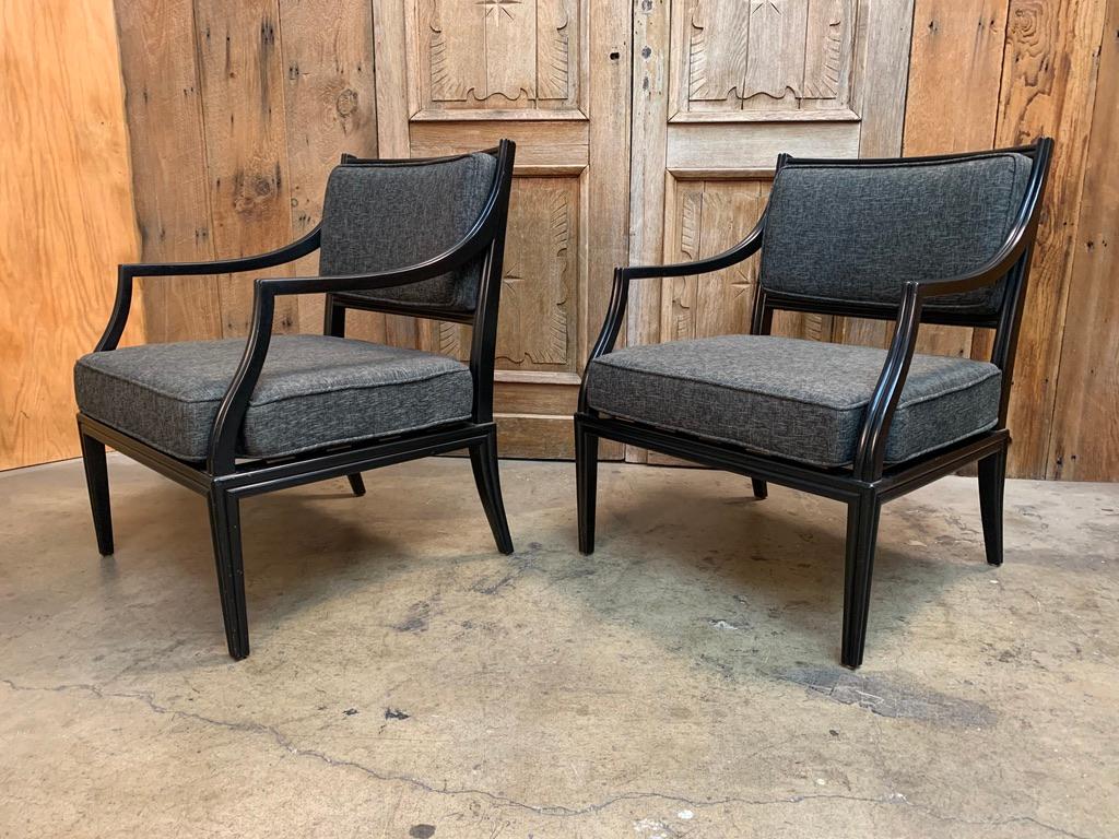 Armchairs by Edward Wormley for Dunbar. Signed at the bottom. With original ebonized finish.